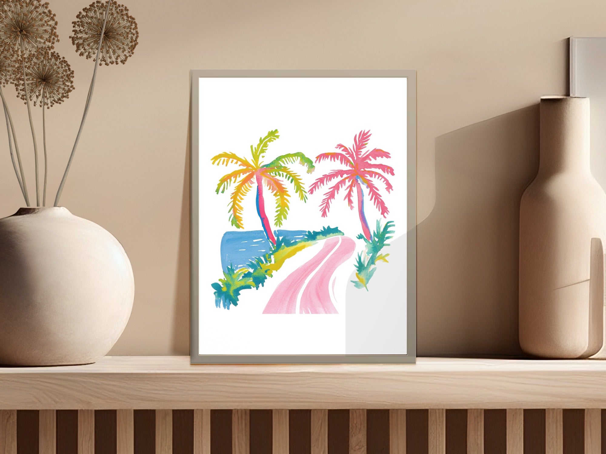 Watercolor painting of a tropical road with palm trees and ocean.