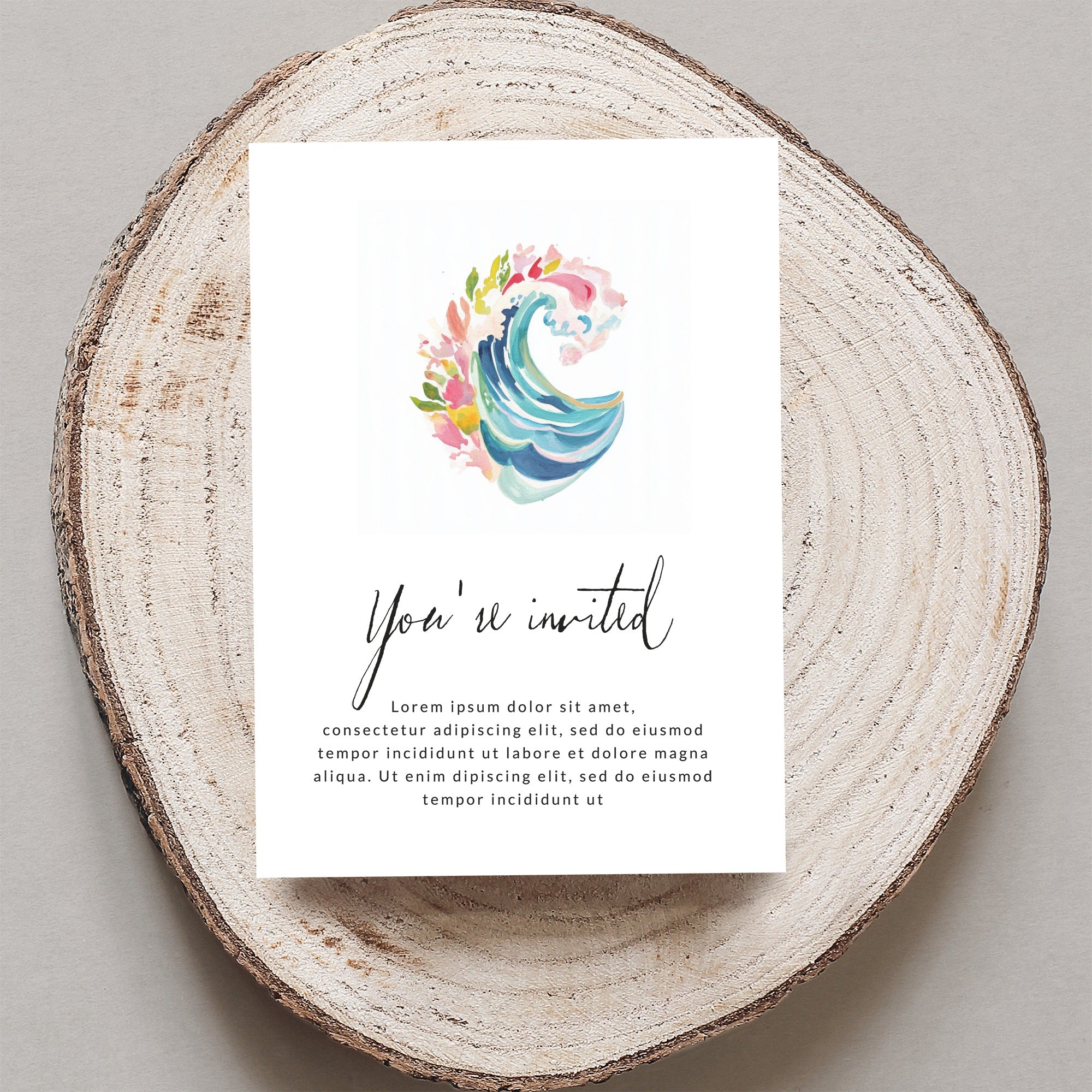 Invitation card with "You're invited" text and abstract wave design.