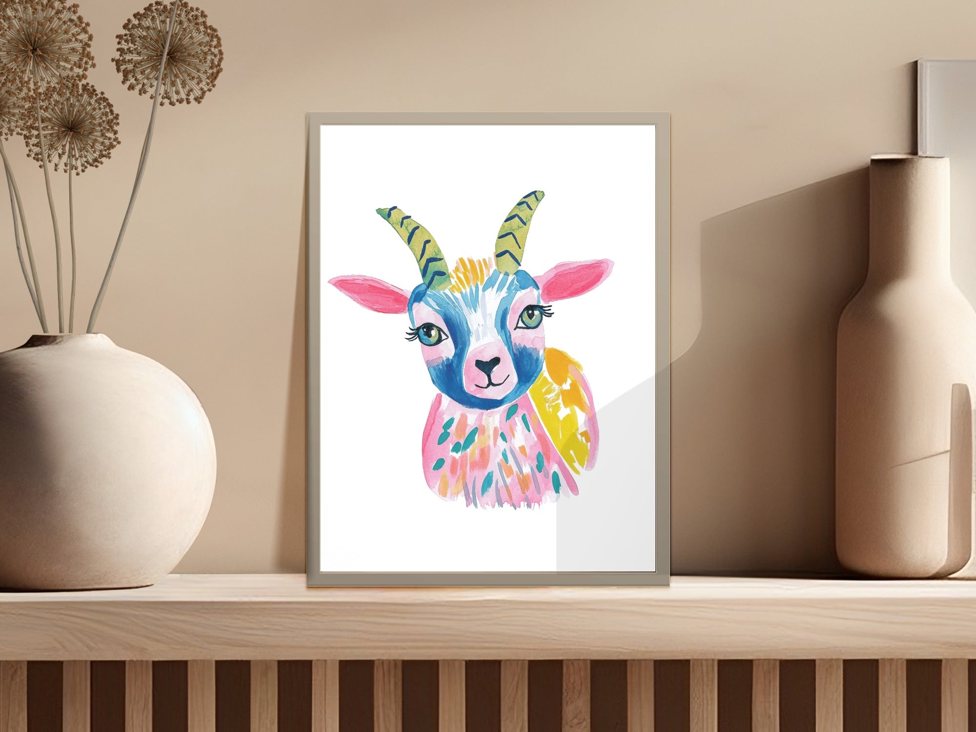 Colorful watercolor painting of a friendly goat with bright eyes and horns.