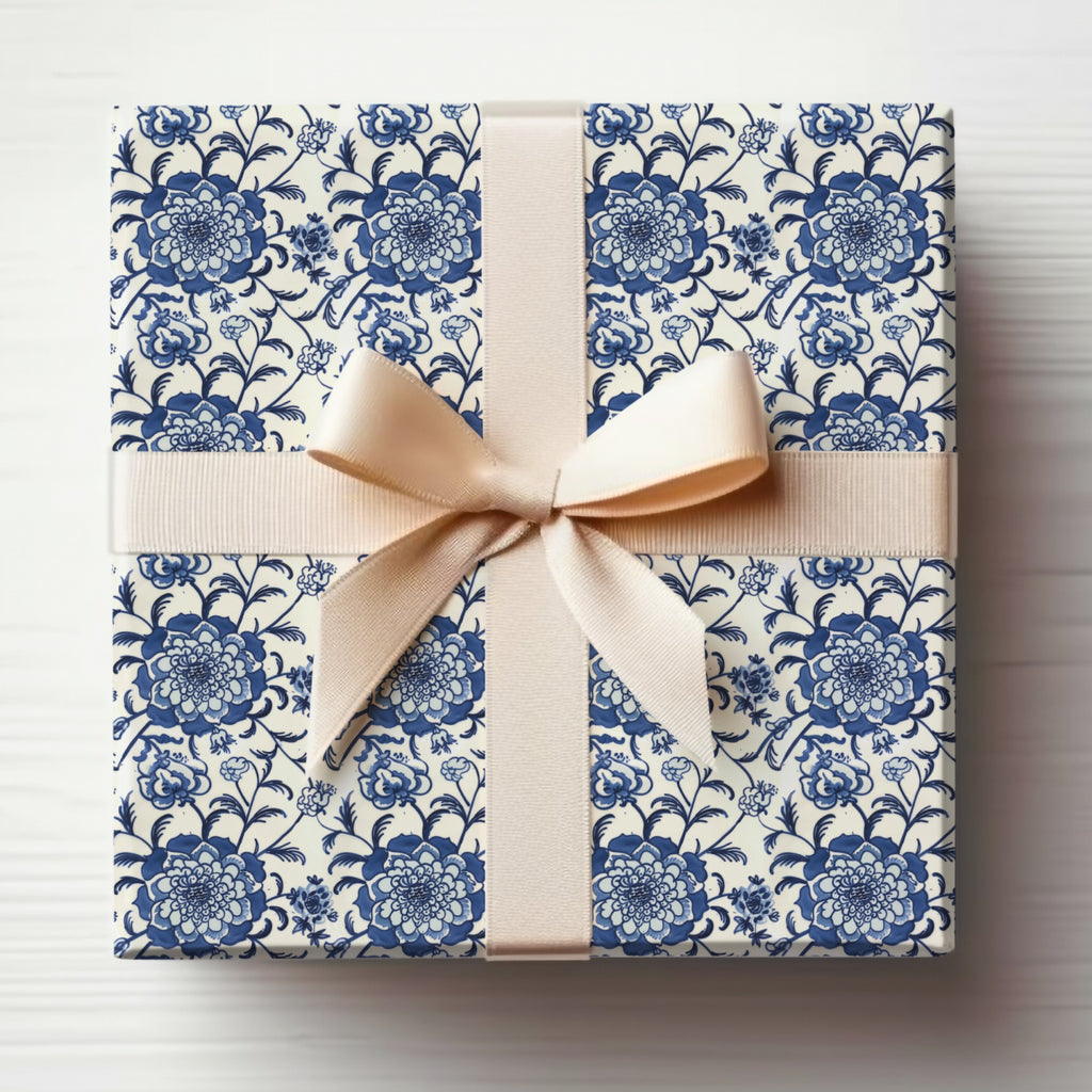 Elegant Blue Floral Gift Wrapping with Cream Ribbon Design