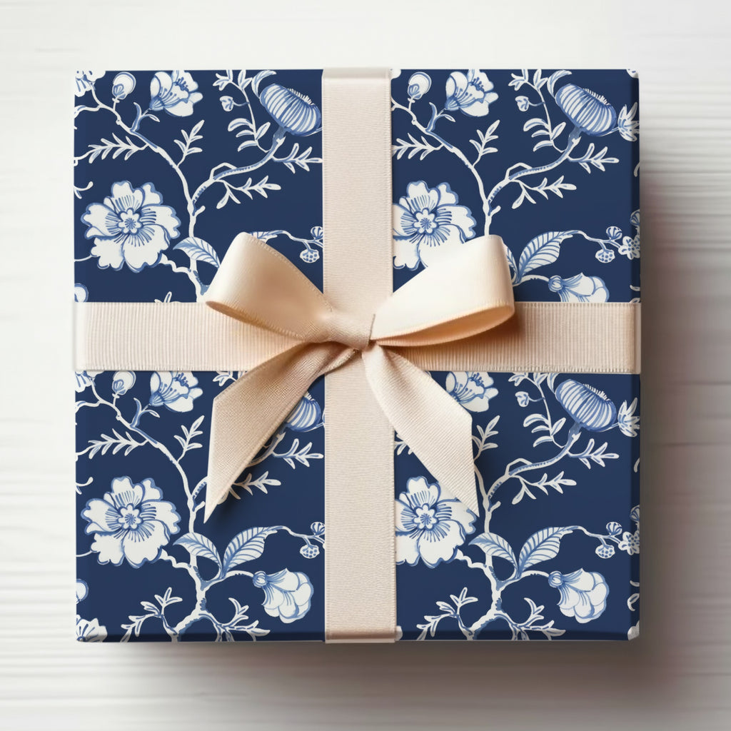 Elegant Blue Floral Gift Wrap with Cream Ribbon design