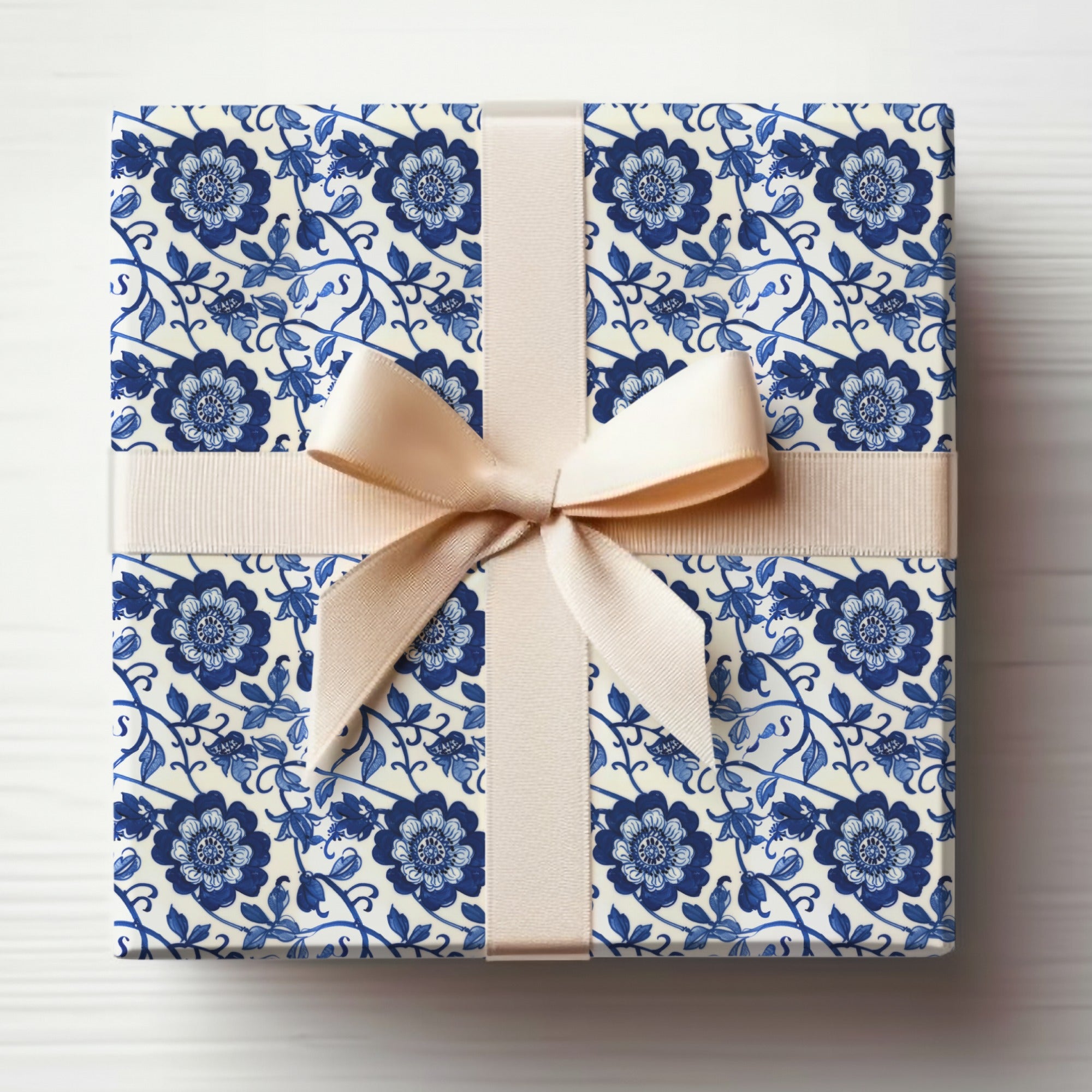 Elegant Blue Floral Gift Wrap with Cream Ribbon Detailing