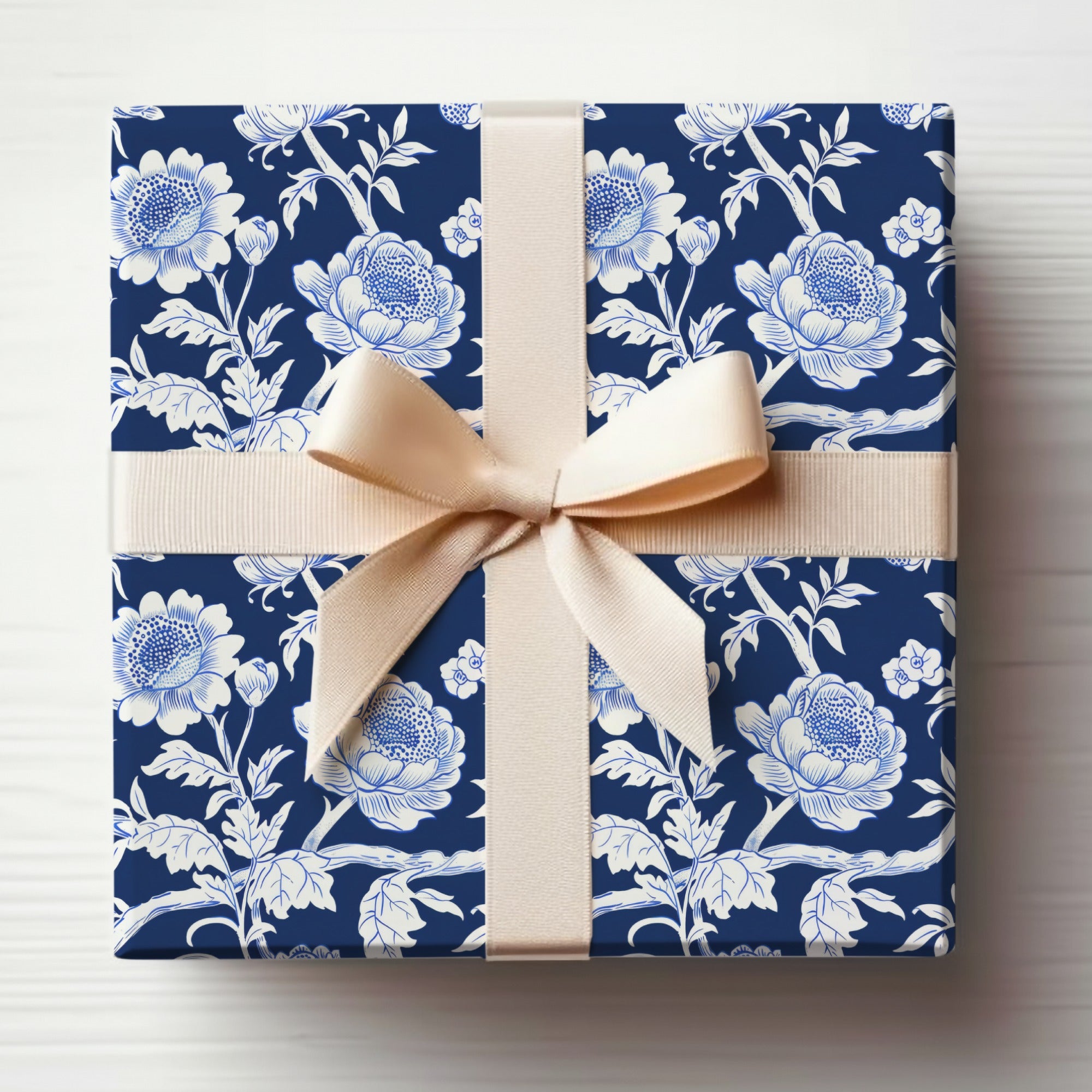Elegant Blue Floral Gift Wrap with Cream Ribbon