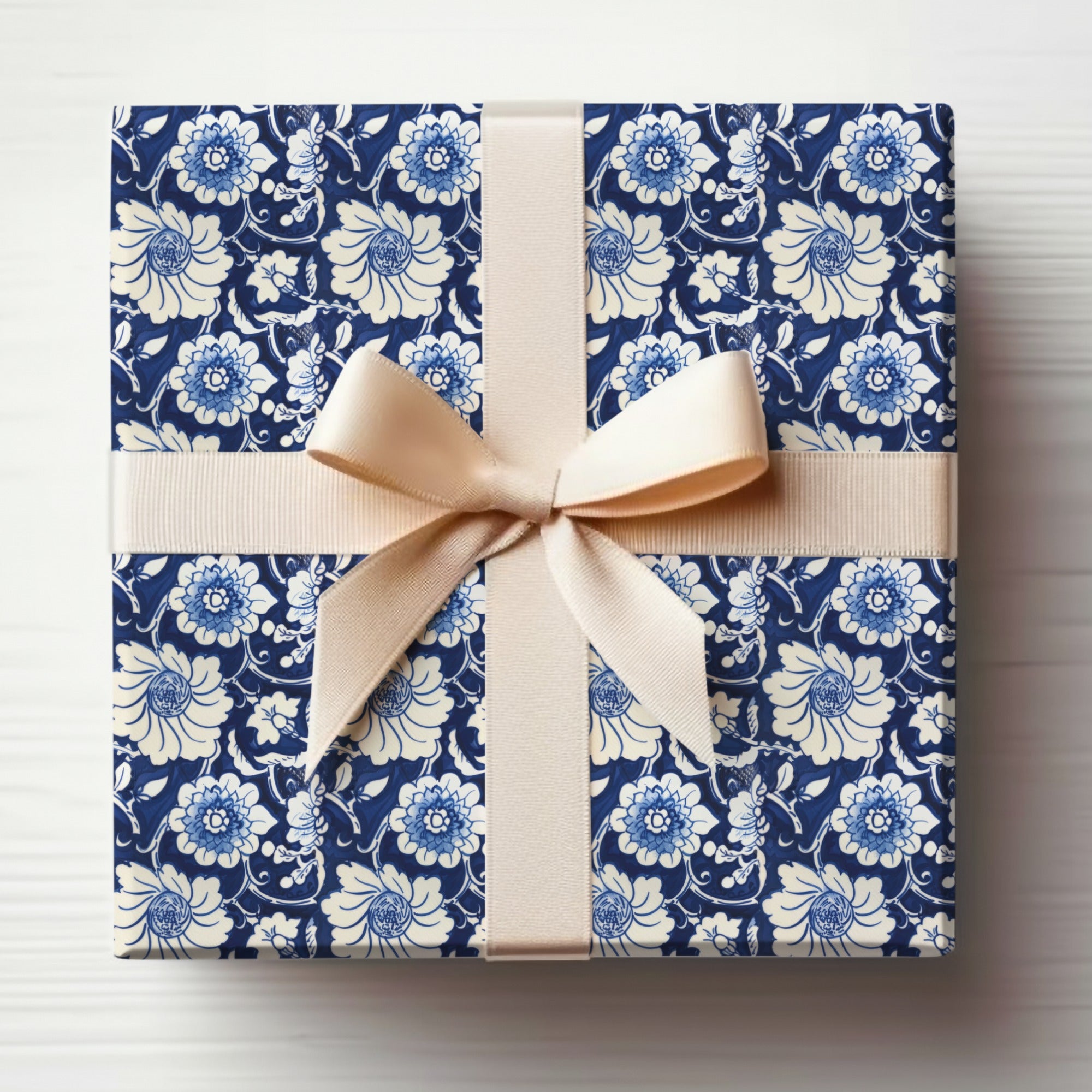 Elegant Blue Floral Gift Box with Cream Ribbon Design