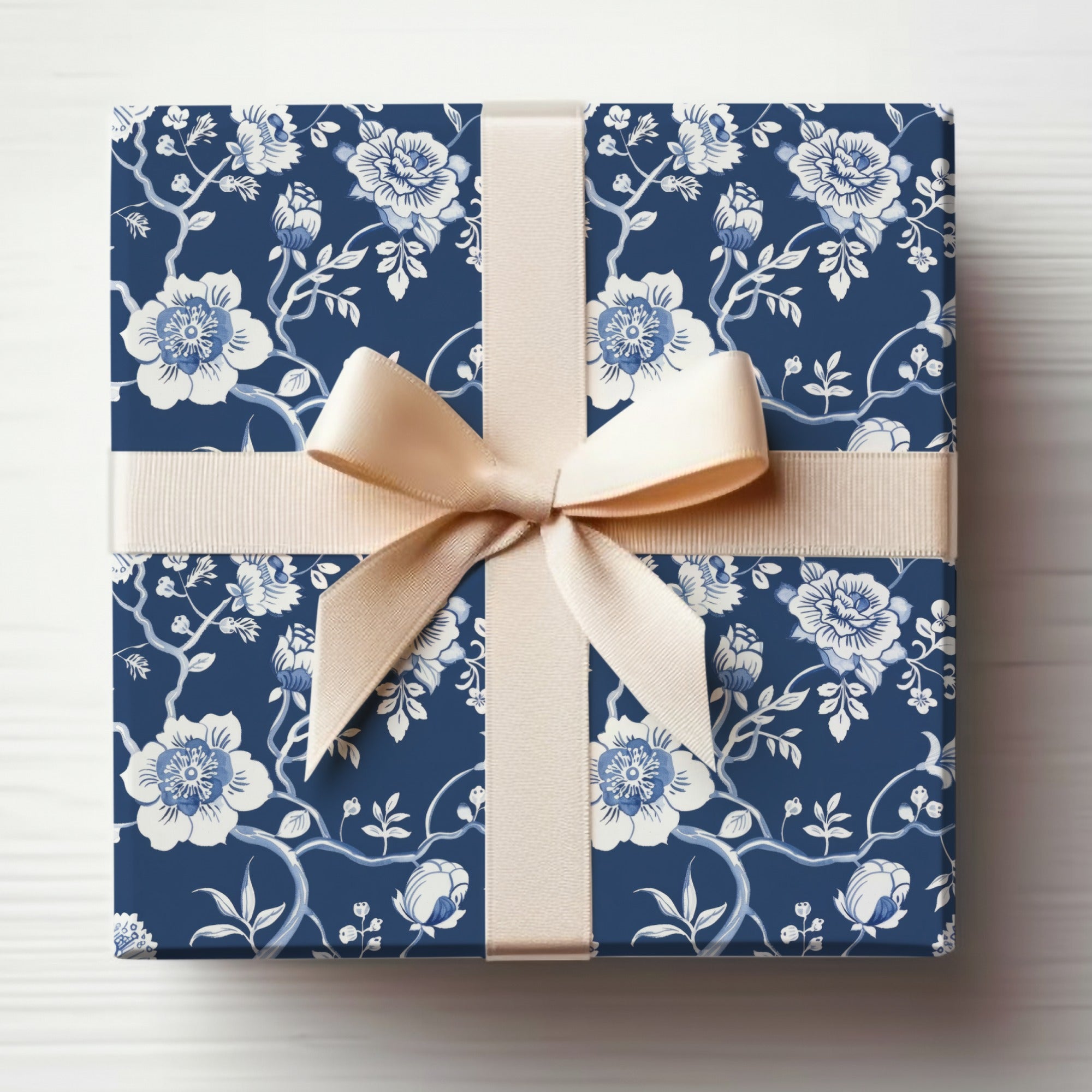 Elegant Blue Floral Gift Wrap with Cream Ribbon