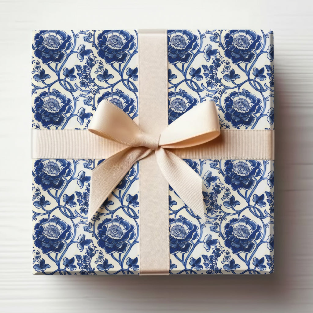 Elegant Blue Floral Gift Wrap with Bow for Any Occasion