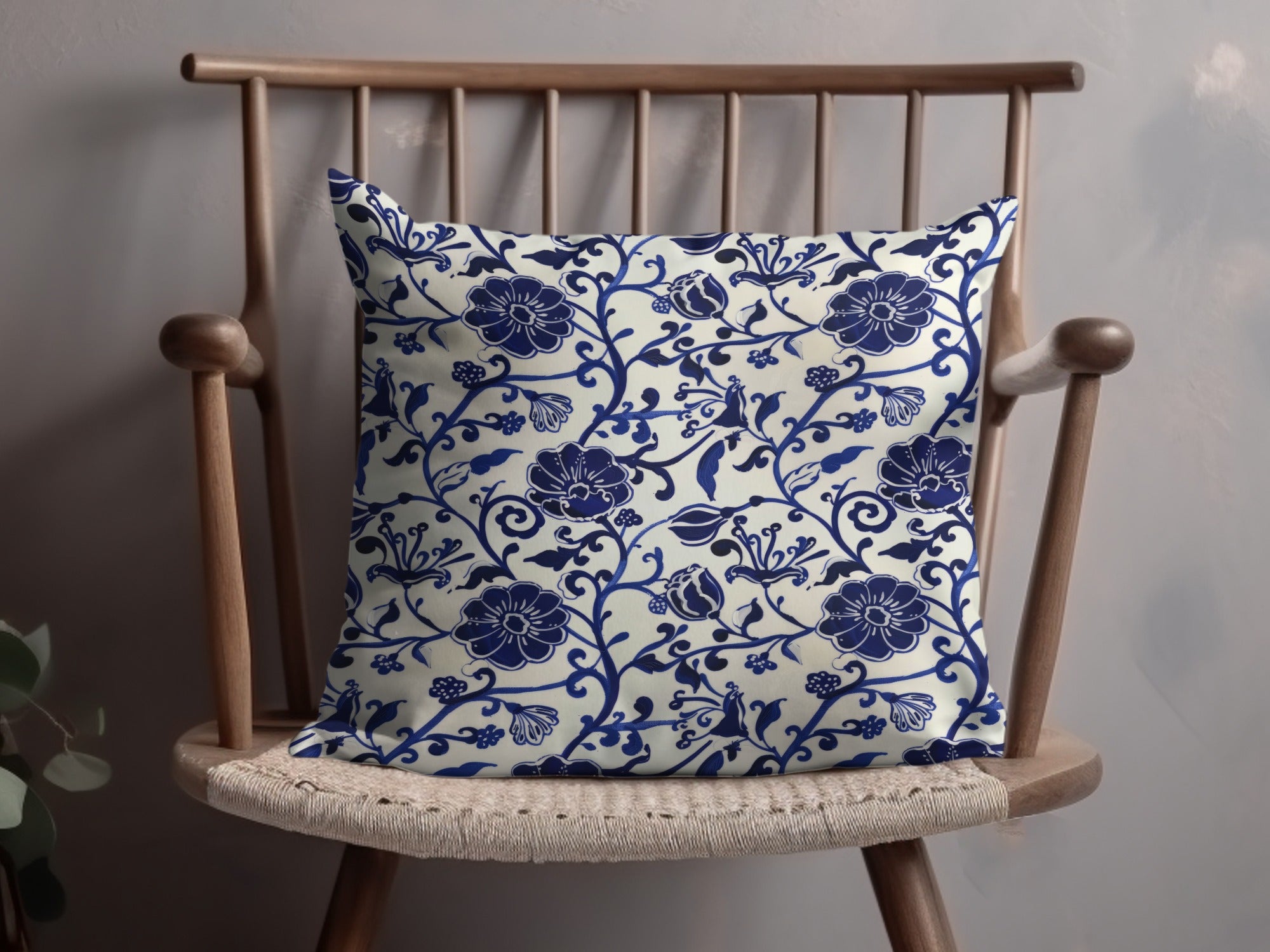 Elegant Blue Floral Design on Decorative Pillow