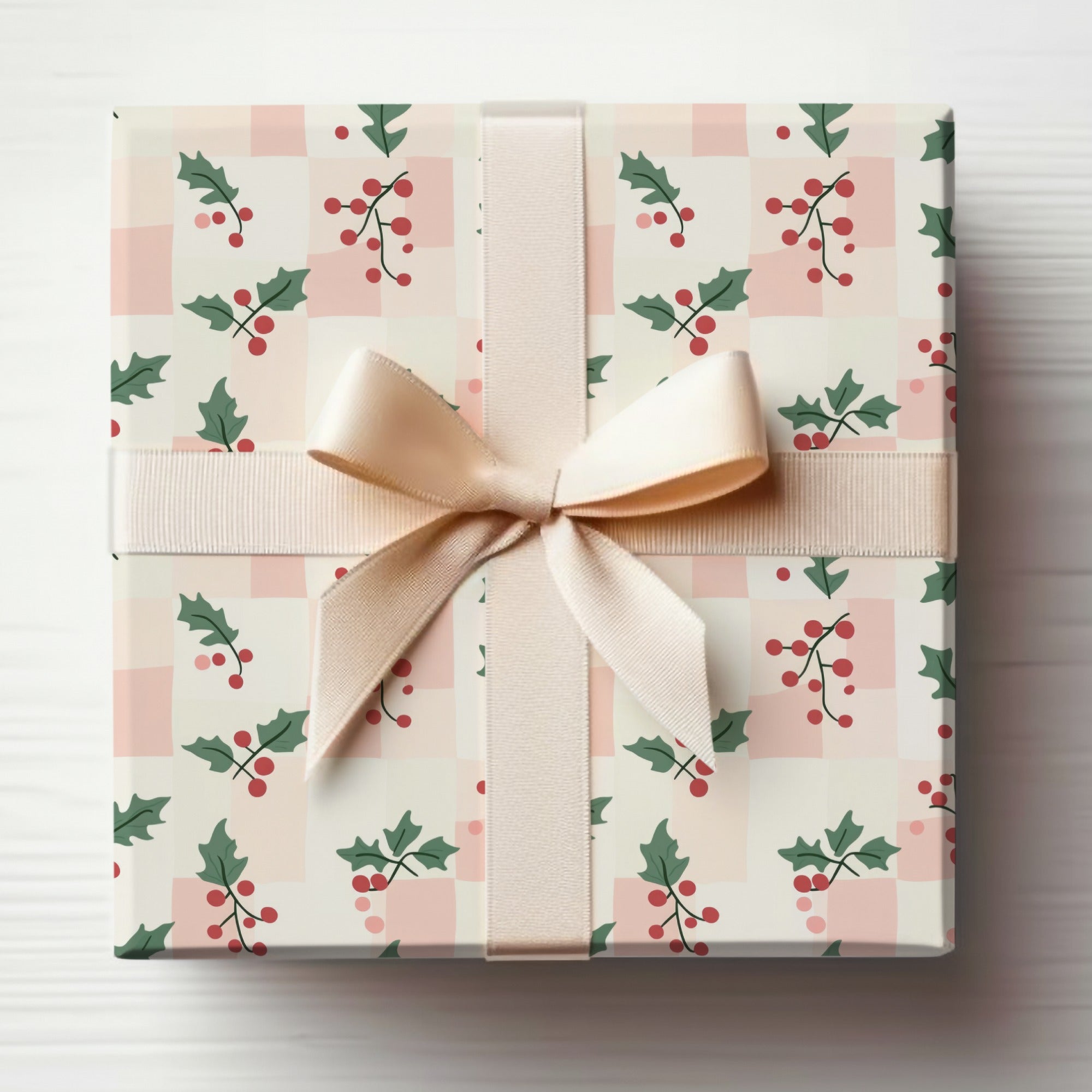 Festive Holiday Gift Wrapped in Holly Themed Paper