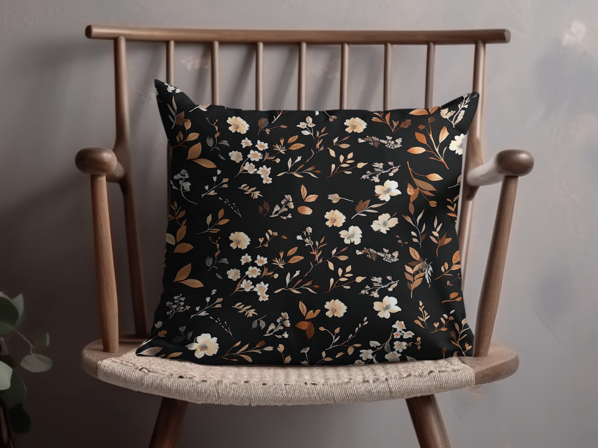 Elegant Black Pillow with Floral Pattern Design