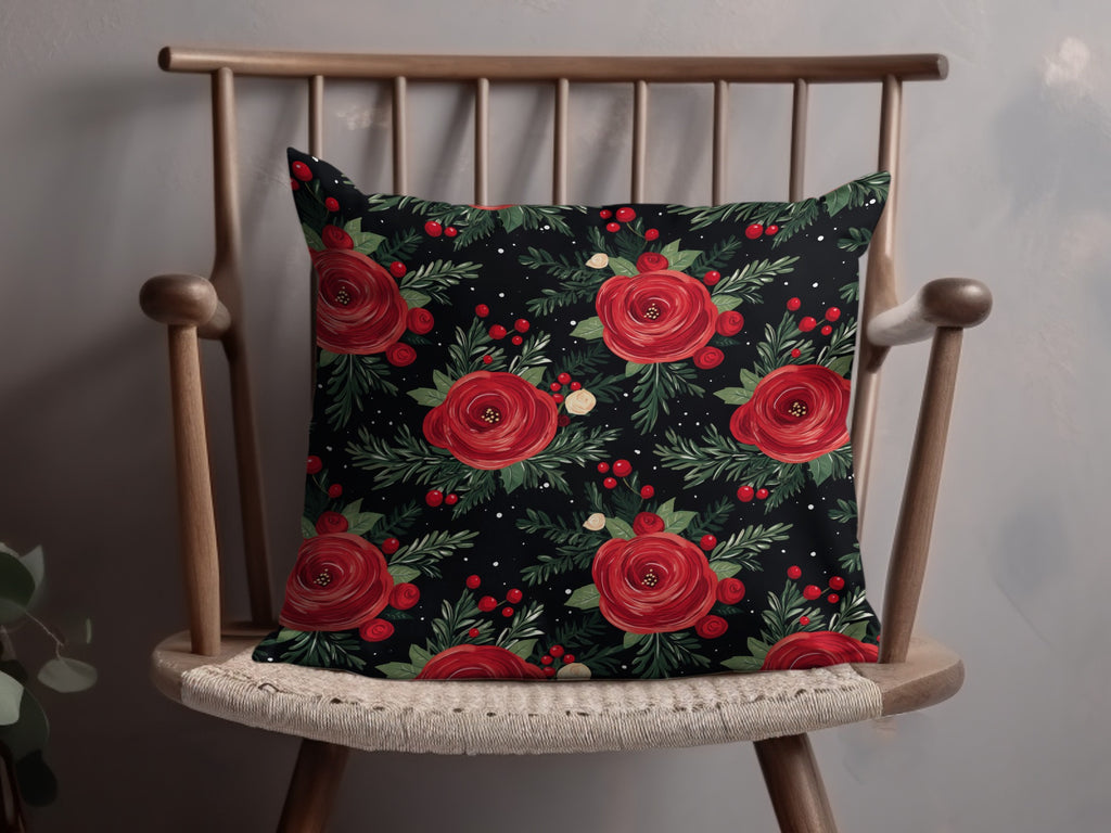 Floral Arrangement on Black Background Artful Design pillow with red roses and green leaves on a wooden chair.