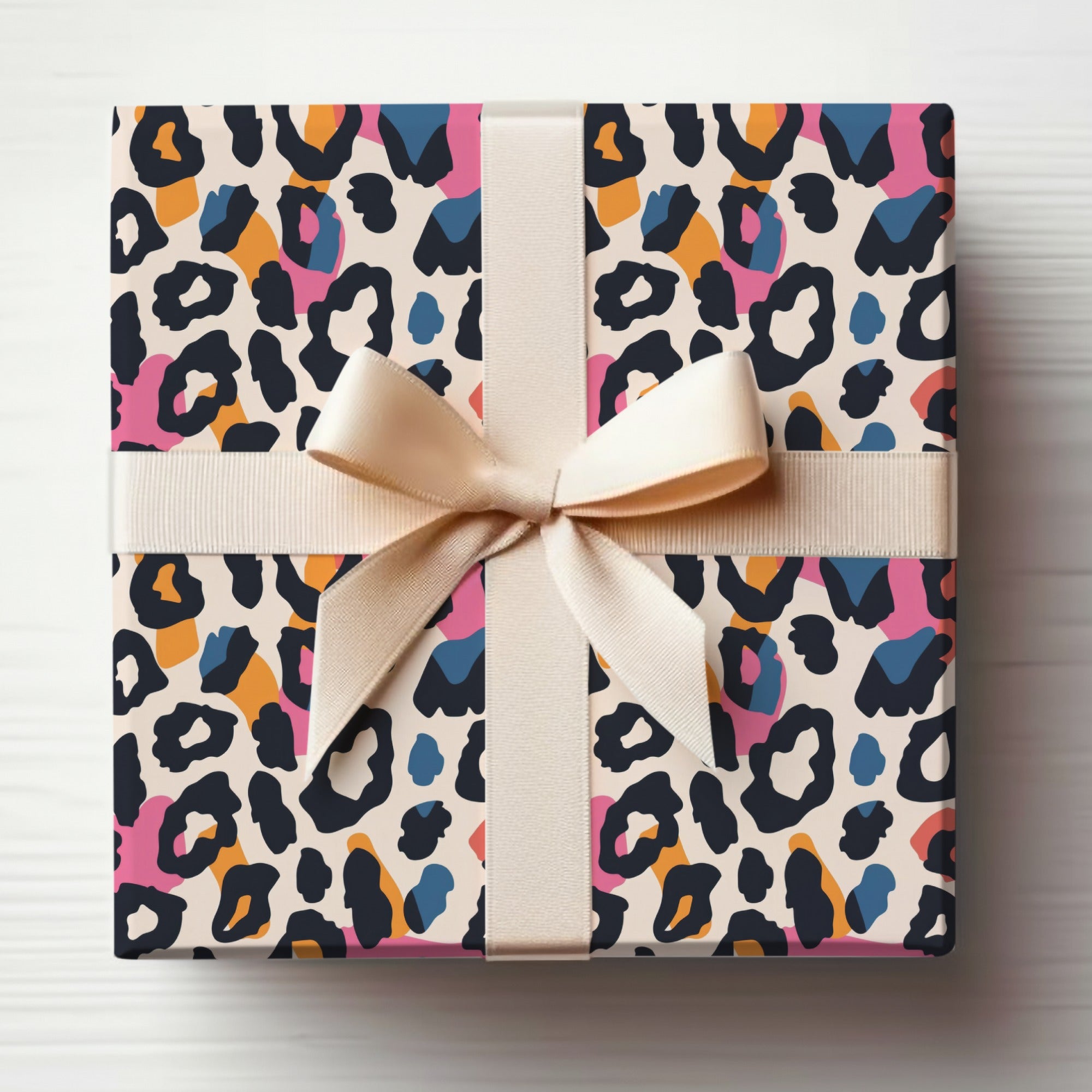Vibrant Leopard Print Gift Wrap with Bow Design