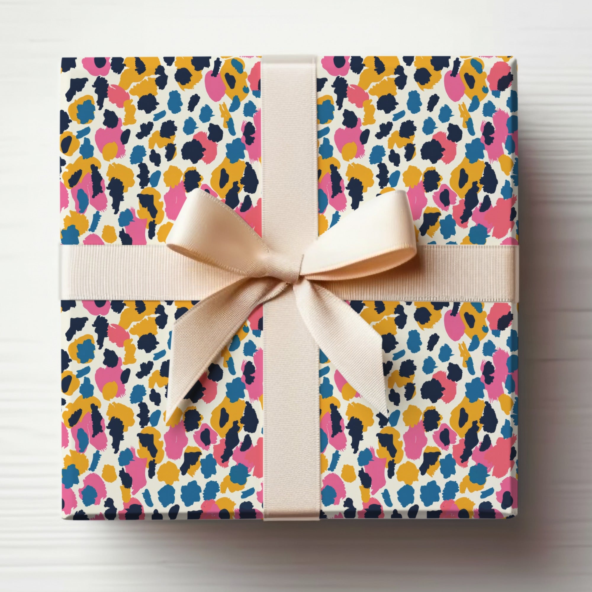 Colorful Leopard Print Gift Wrap with Elegant Ribbon Design