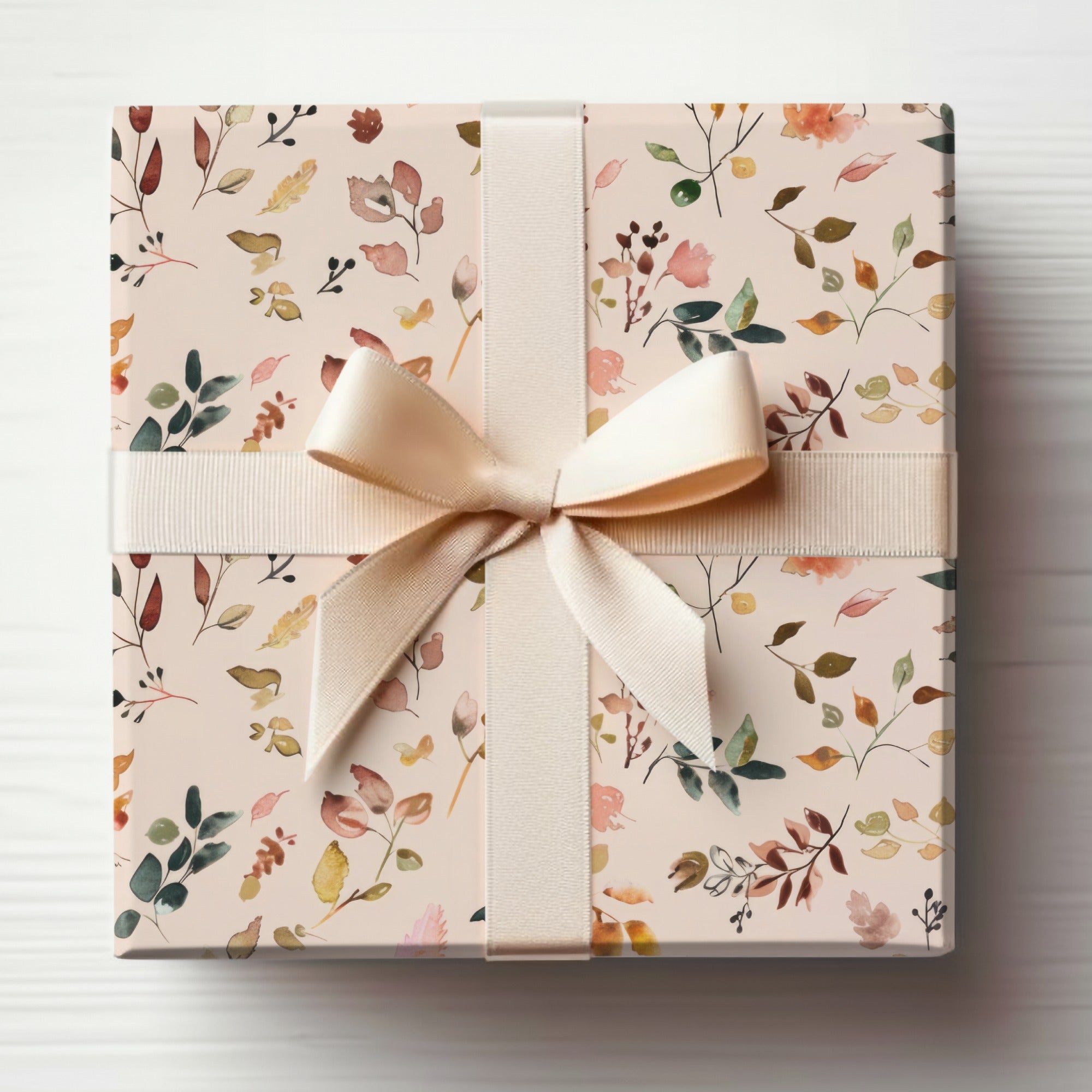 Elegant Floral Gift Wrap with Cream Ribbon Packaging