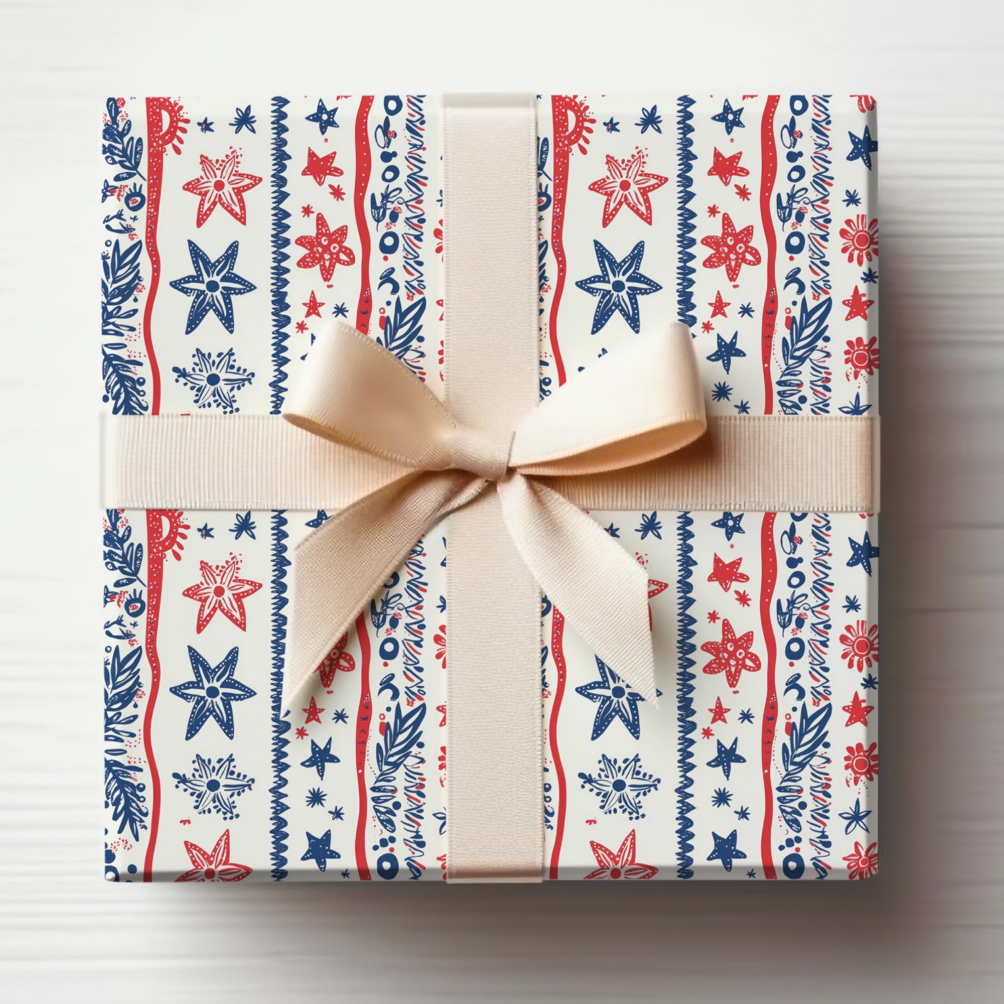 Festive Red and Blue Floral Gift Wrap with Ribbon