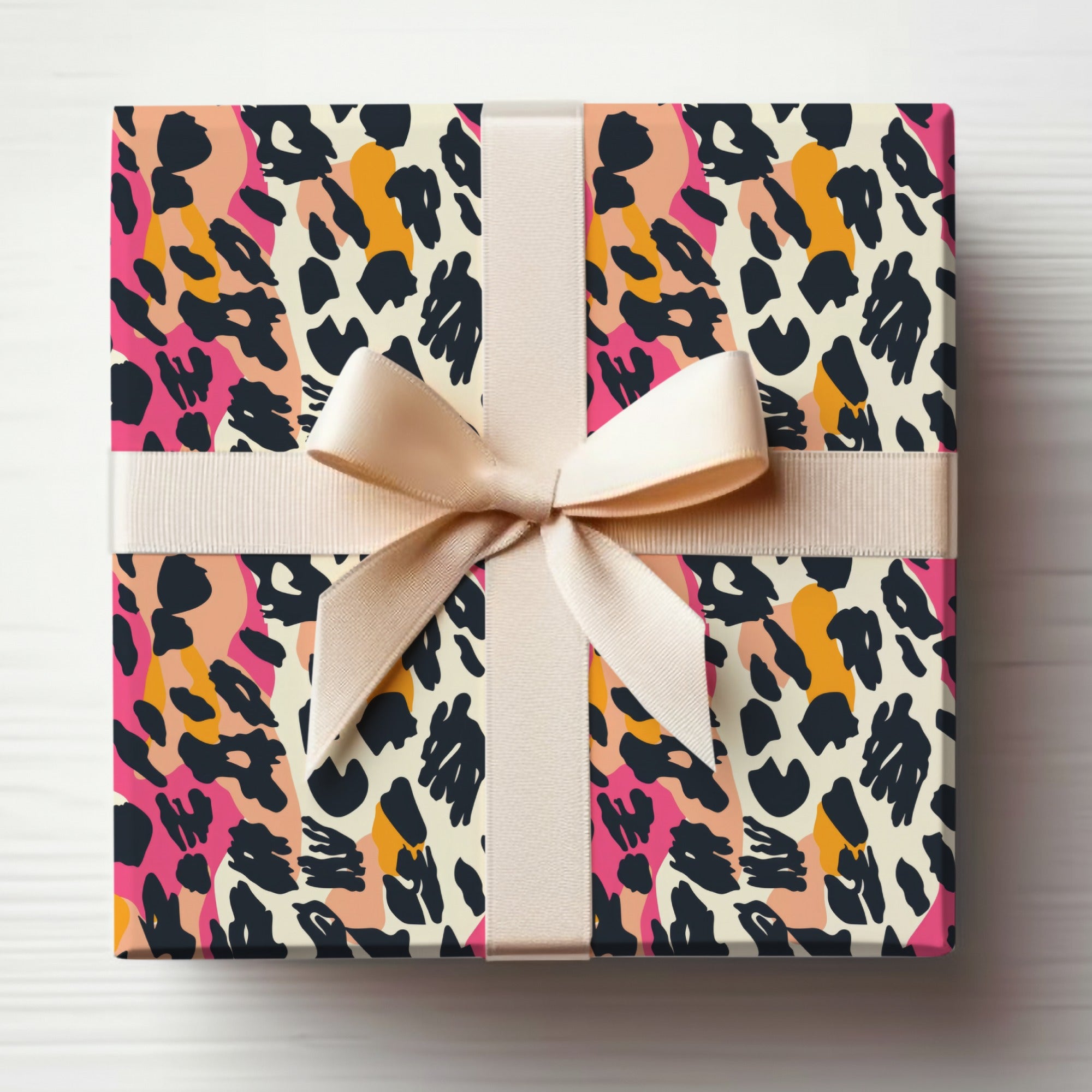 Vibrant Leopard Print Gift Wrap with Beige Ribbon