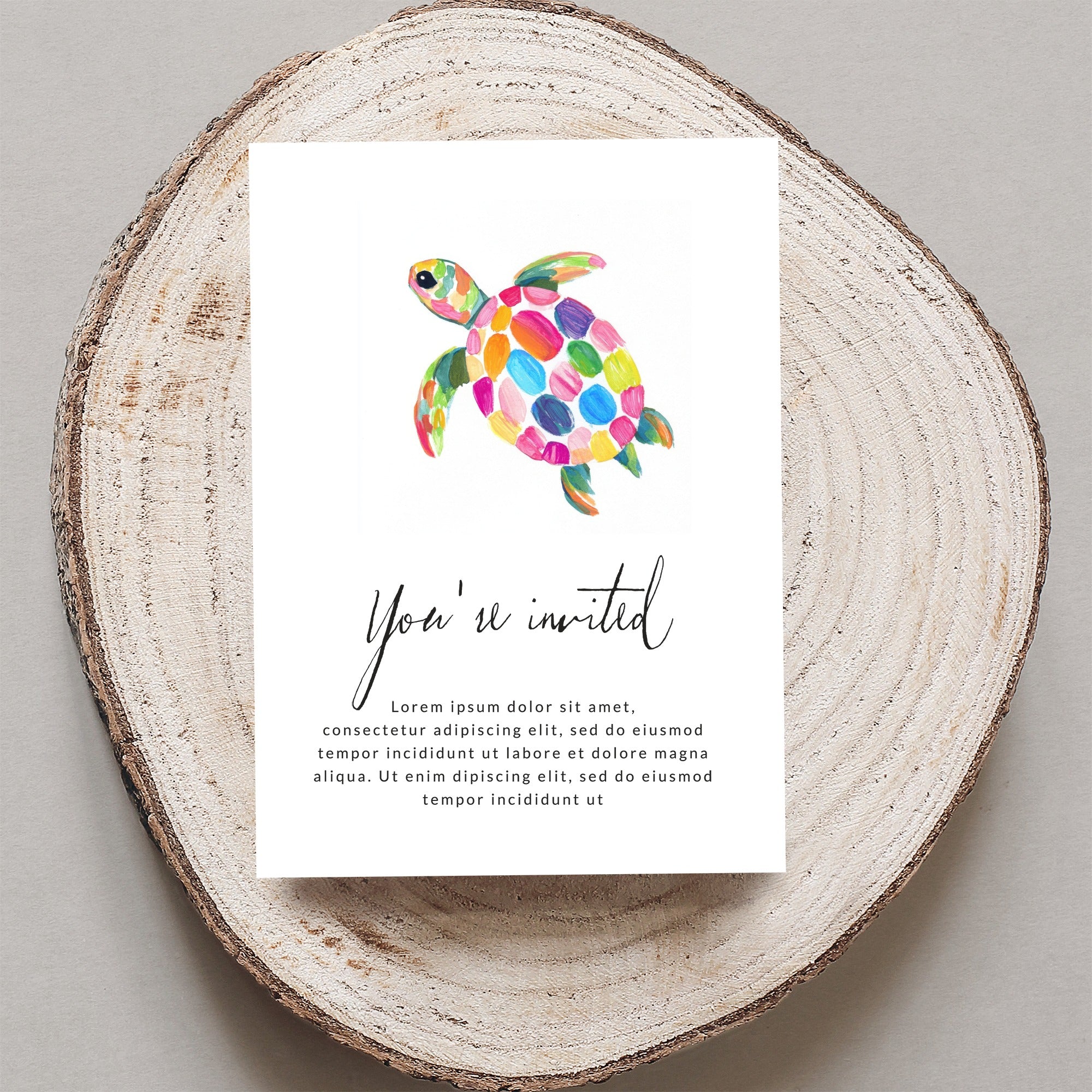 Watercolor sea turtle invitation with "You're invited" text.