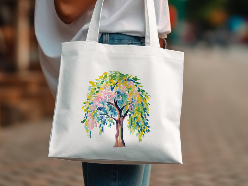 White tote bag with a colorful watercolor weeping willow tree design.