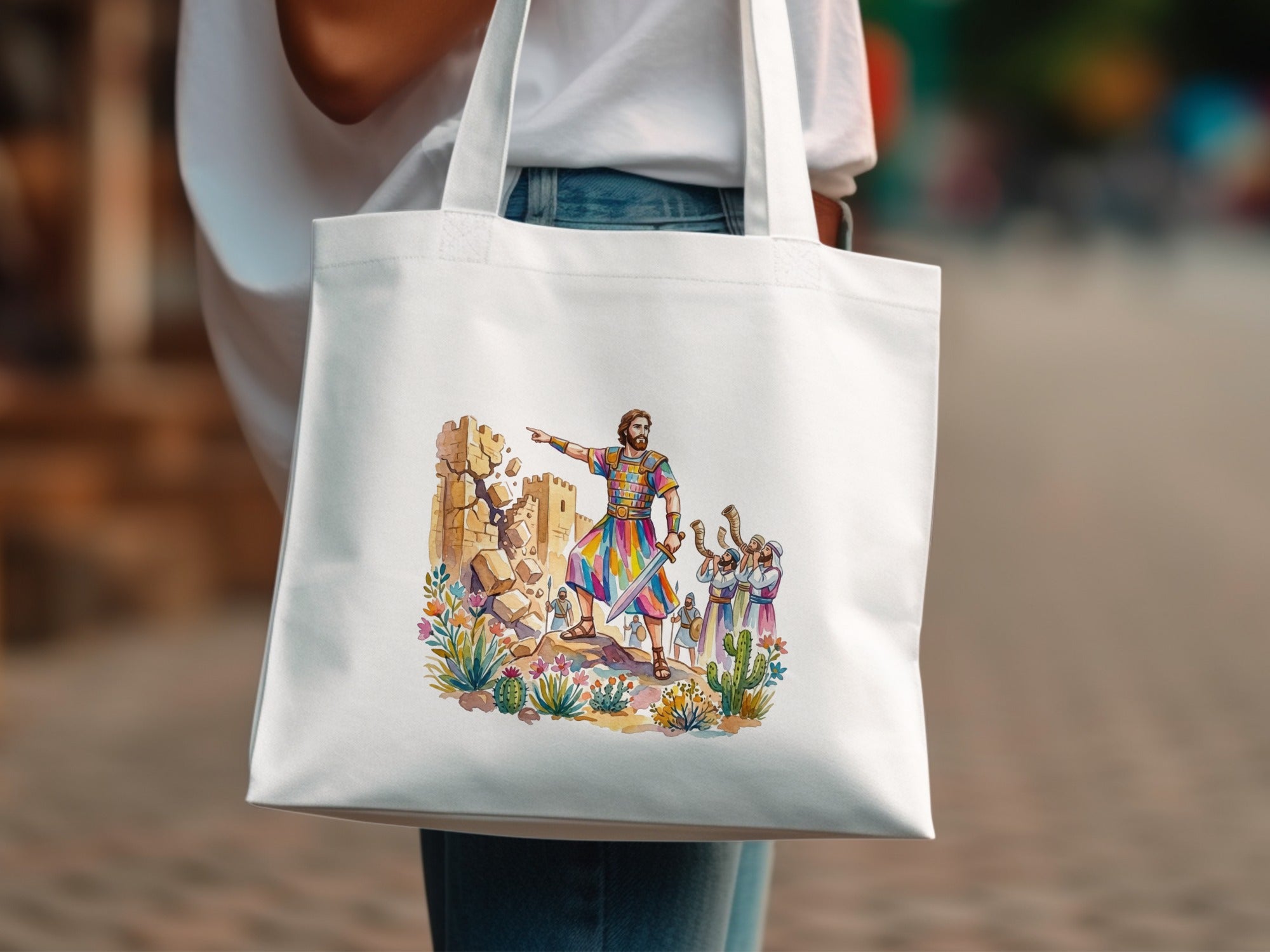 White tote bag with illustration of biblical scene, Jericho walls falling.