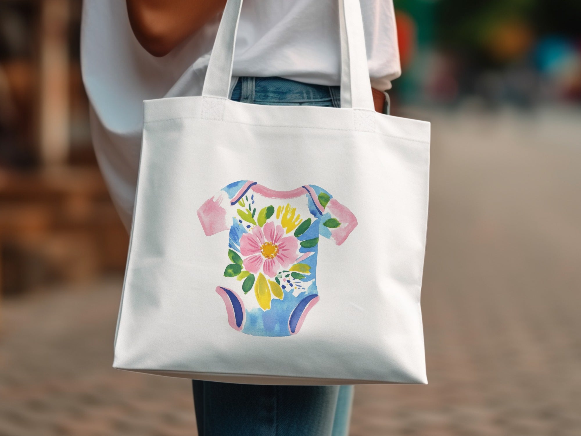 White tote bag with a floral baby onesie design.