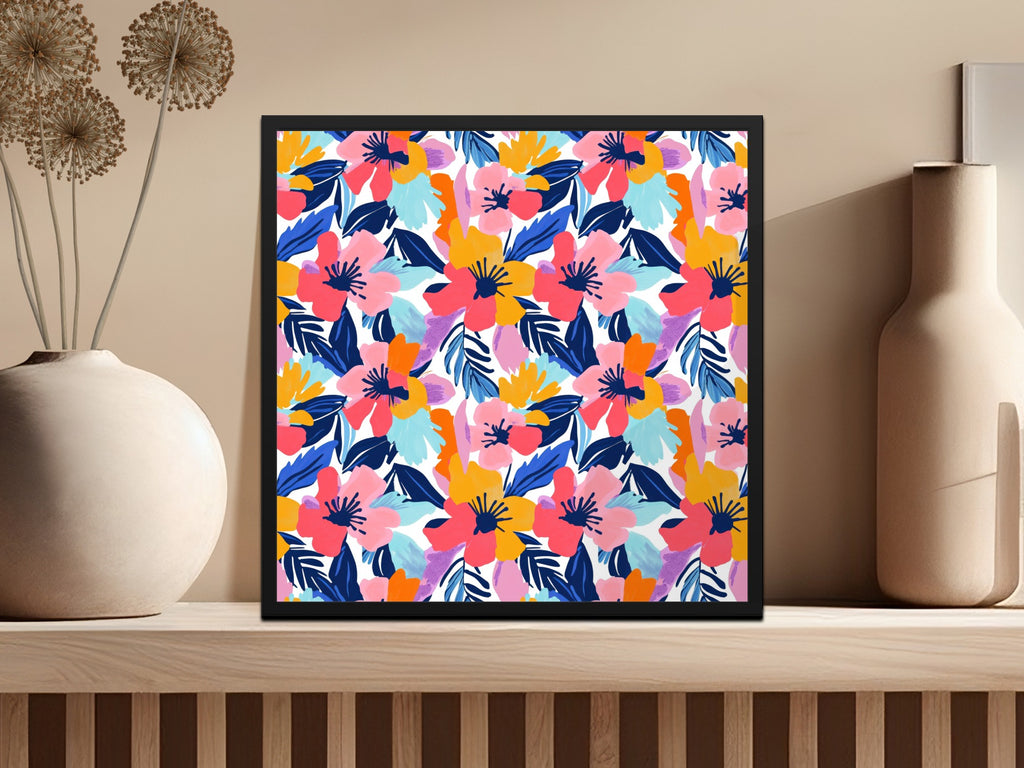 Framed artwork featuring a colorful floral pattern on a wooden shelf.
