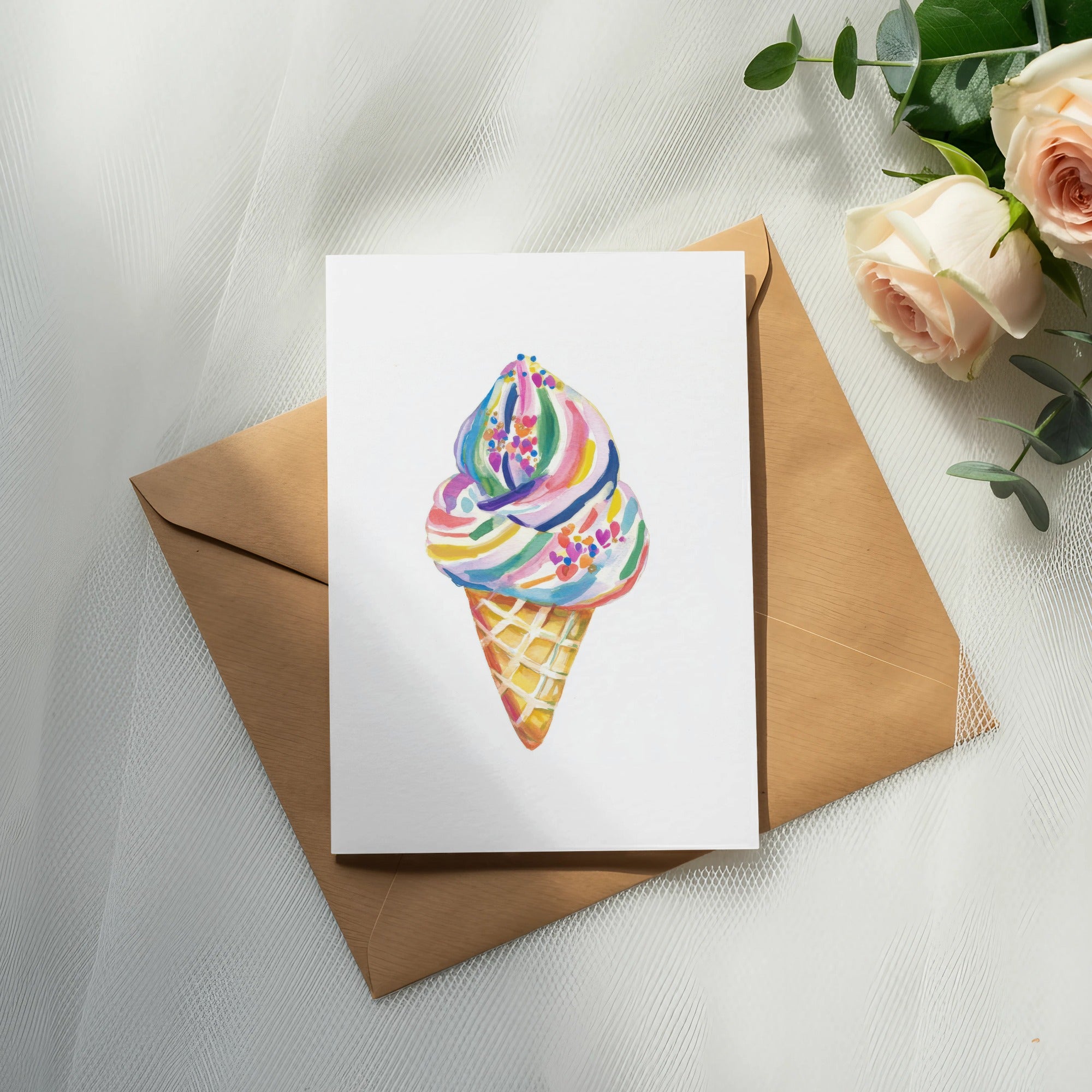 Watercolor ice cream cone with colorful sprinkles on a card.