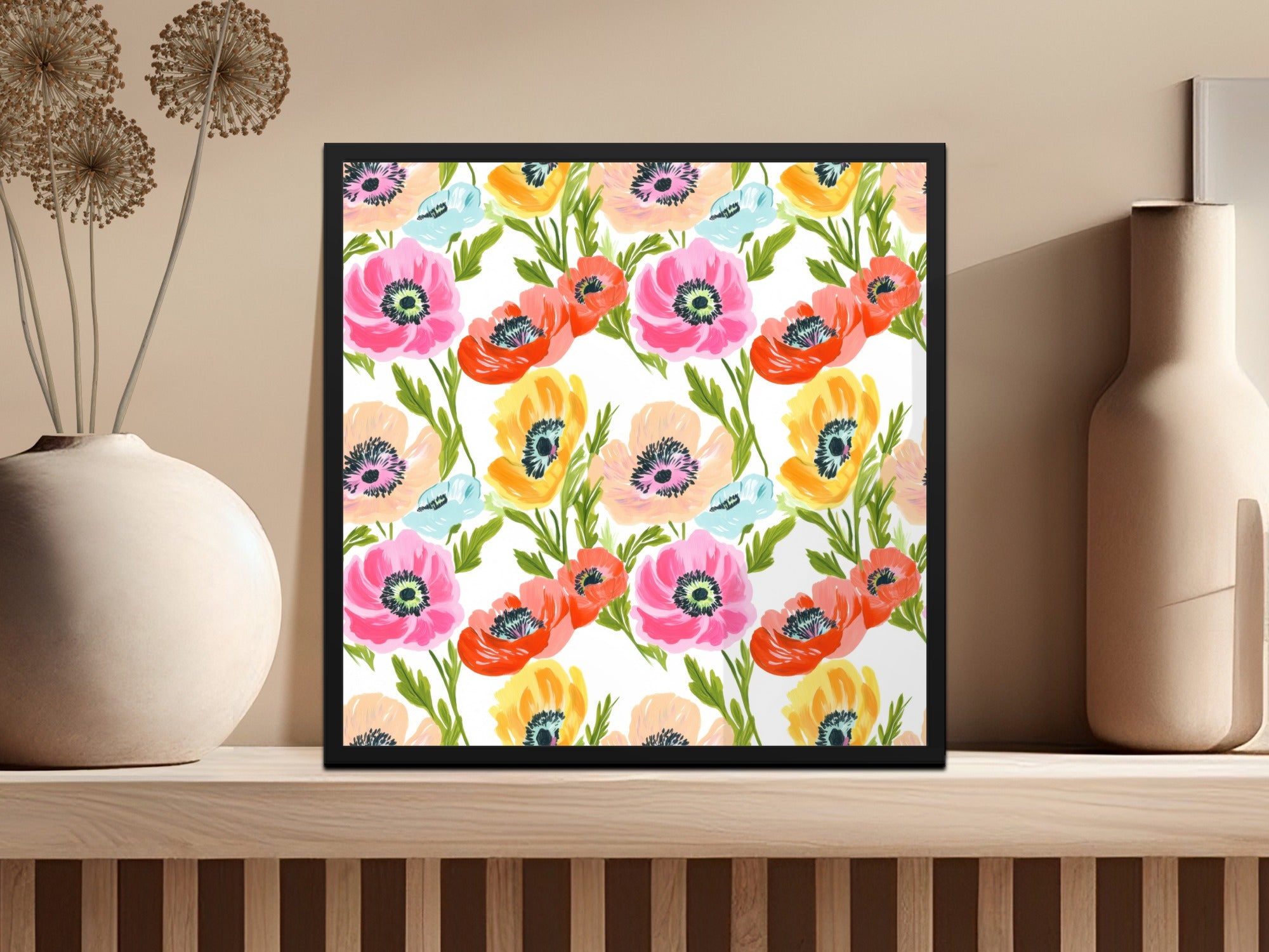 Framed artwork featuring a vibrant floral pattern of poppies and small blue flowers.