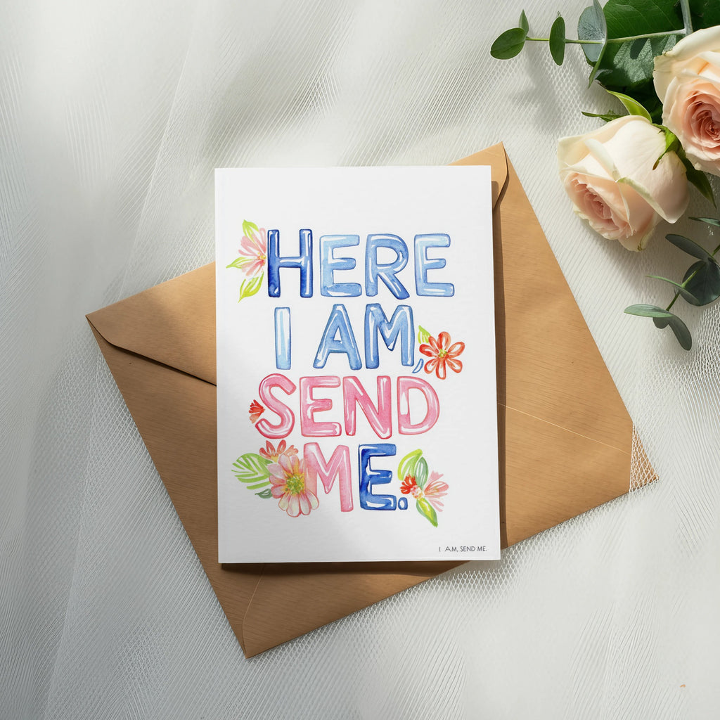 Card with "HERE I AM SEND ME" in watercolor letters, on an envelope.