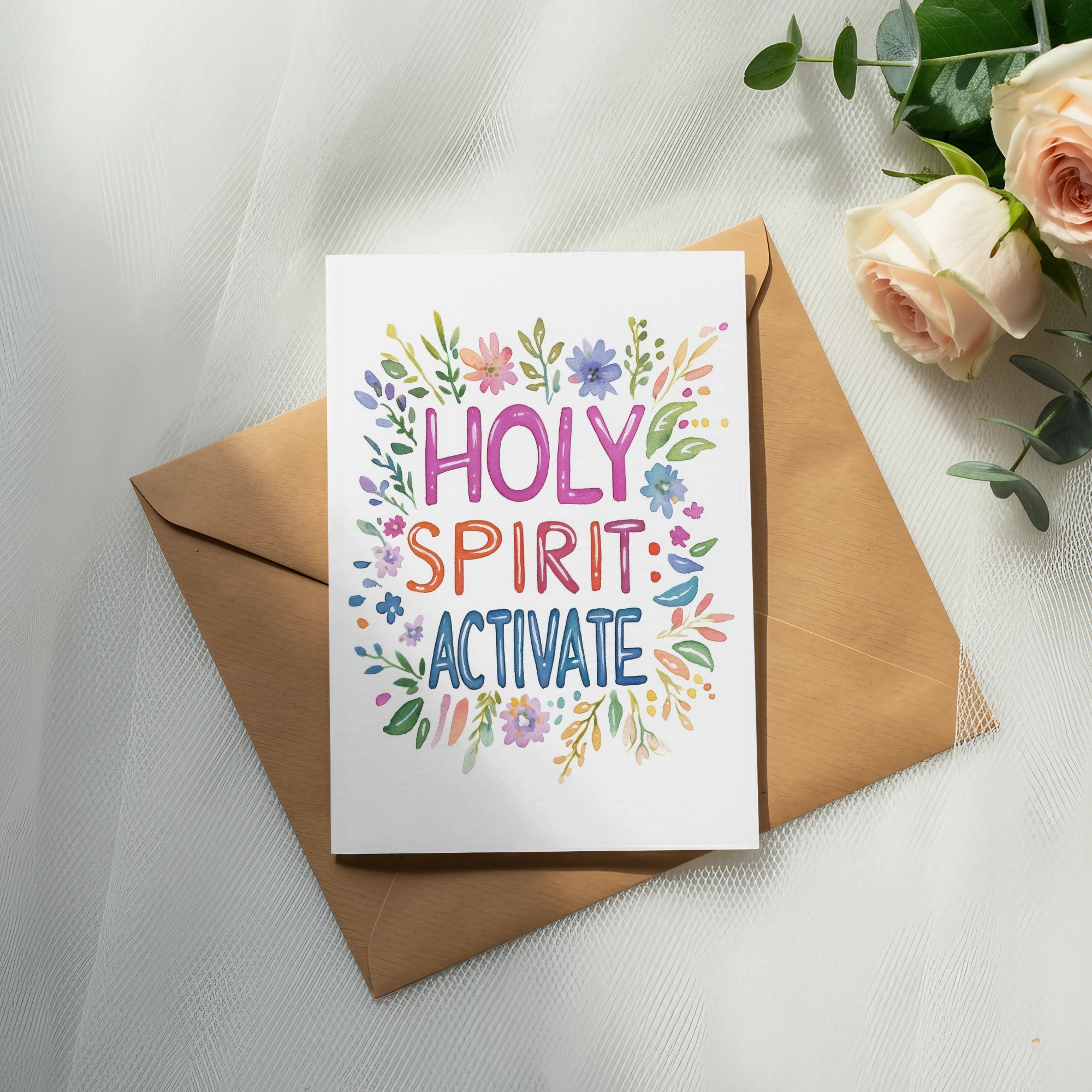 Card with "HOLY SPIRIT: ACTIVATE" text surrounded by colorful flowers on an envelope.