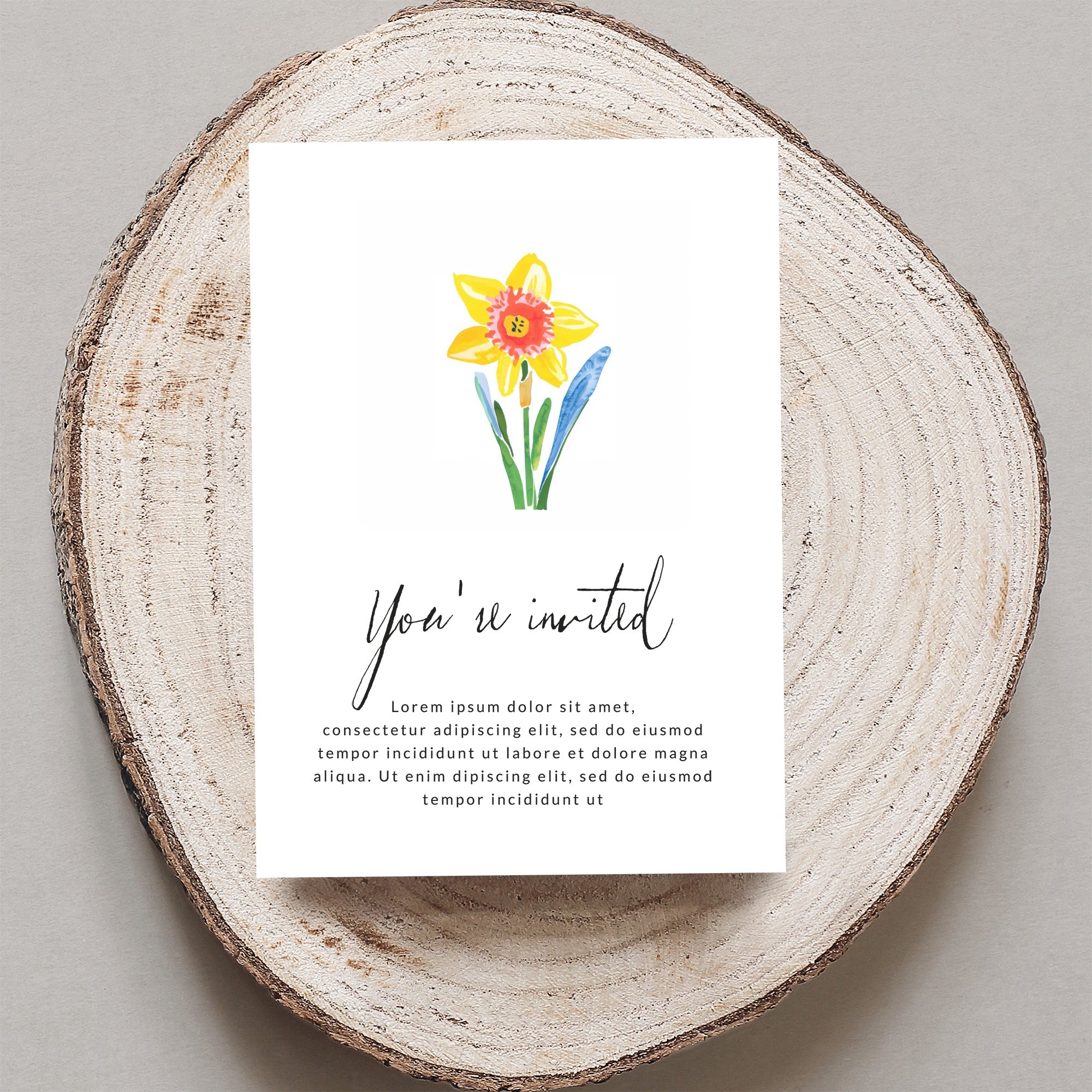 "You're invited" card with watercolor daffodil and placeholder text.