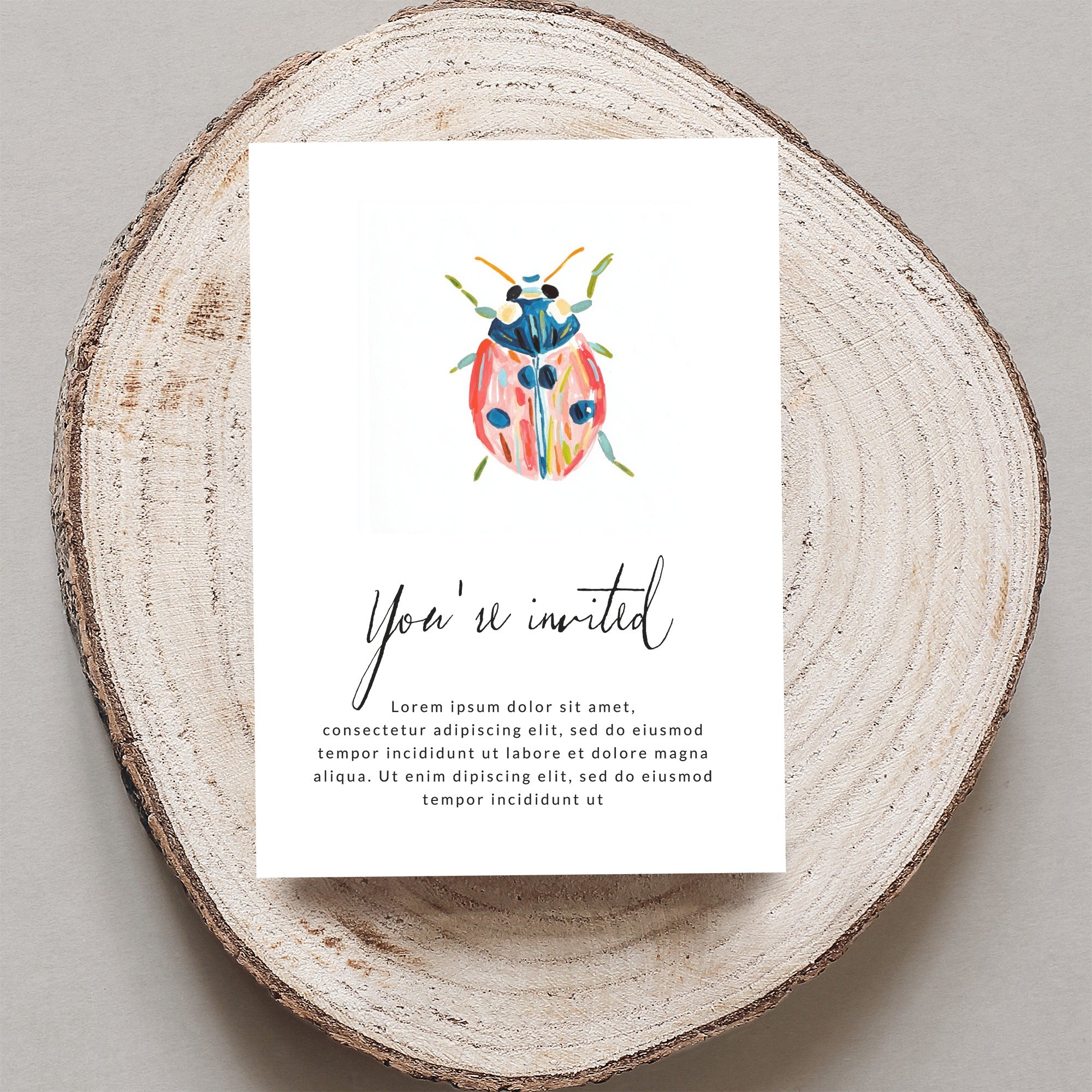 Card with watercolor ladybug and "You're invited" text.