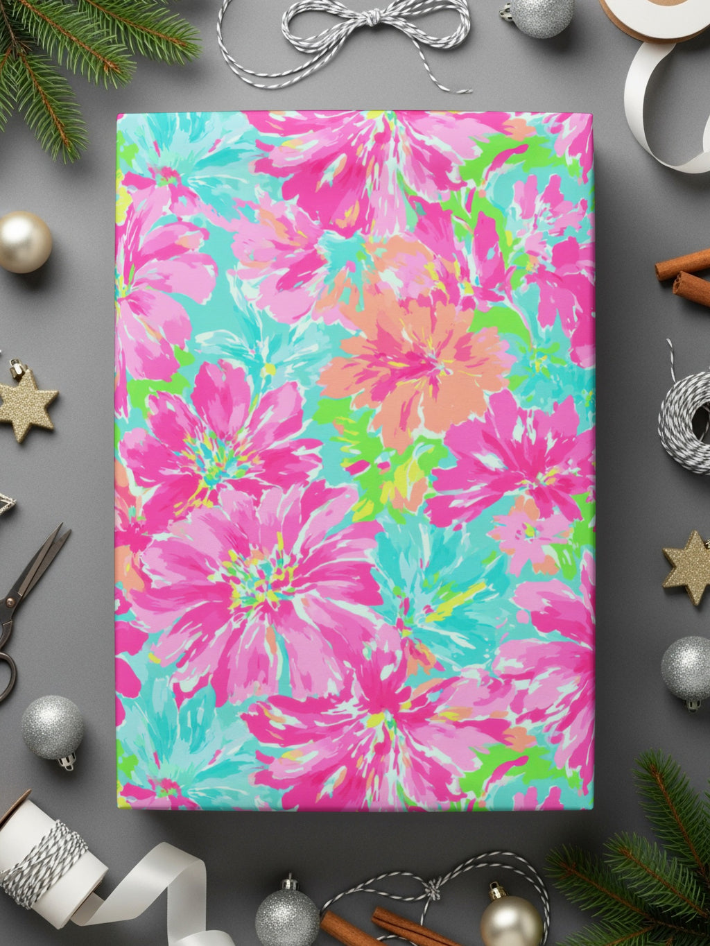 Bright floral wrapping paper with pink, turquoise, and orange flowers.