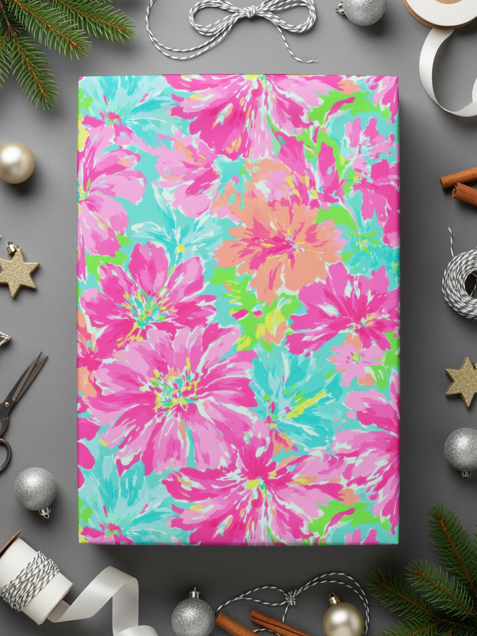Bright floral wrapping paper with pink, turquoise, and orange flowers.