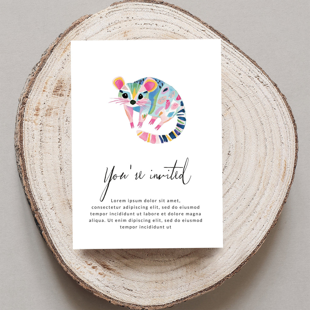 Colorful illustrated raccoon on an invitation with "You're invited" text.