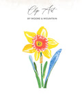 Yellow daffodil flower with green stems and blue leaves.