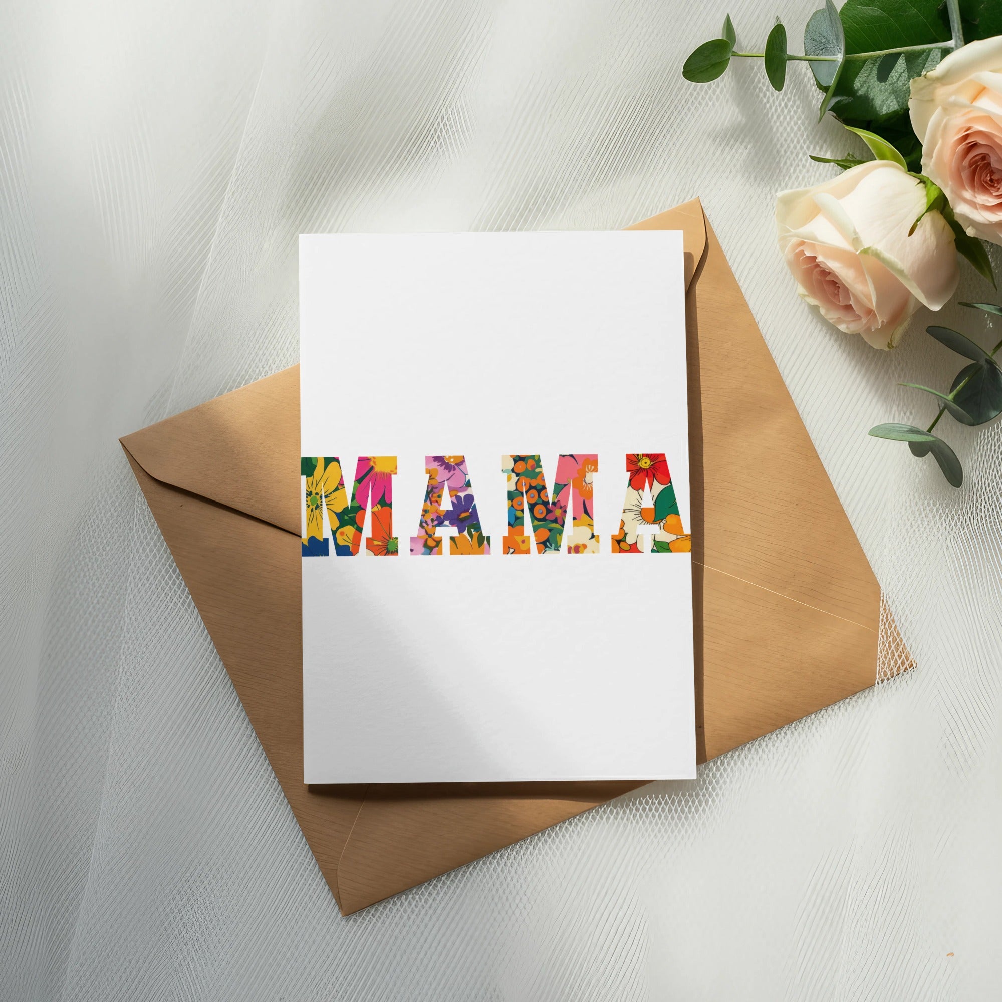 Card with "MAMA" in floral letters on a brown envelope.