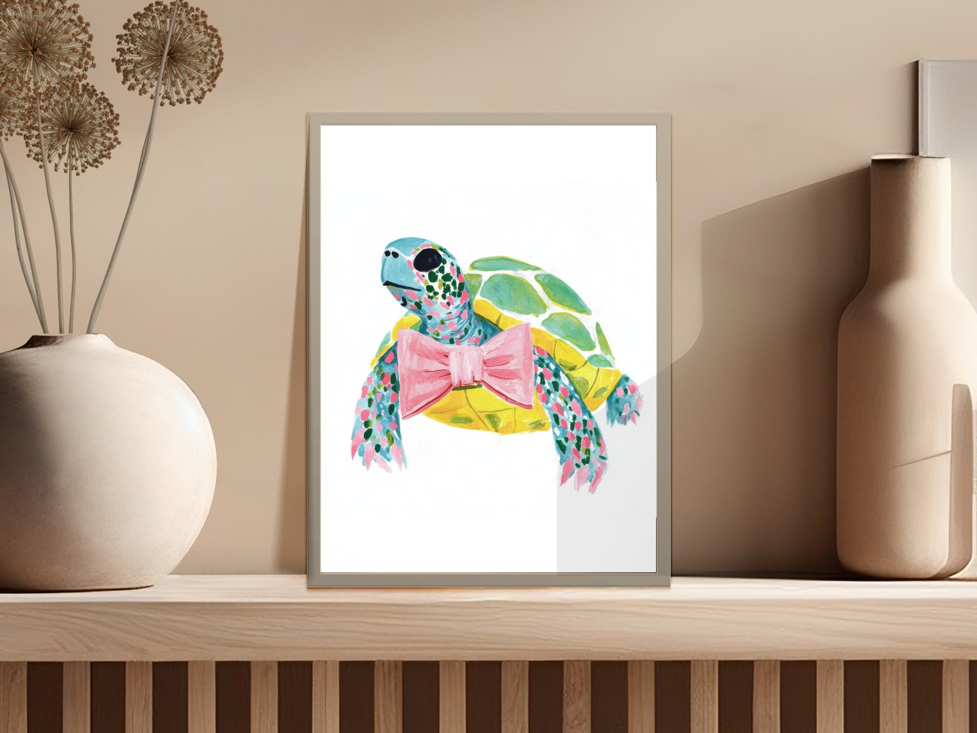 Watercolor turtle with a pink and yellow bow on a shelf with vases.
