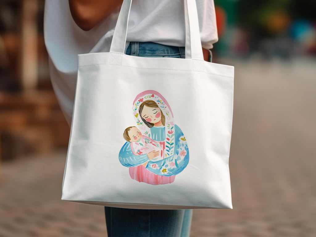White tote bag with watercolor illustration of a mother holding her baby.