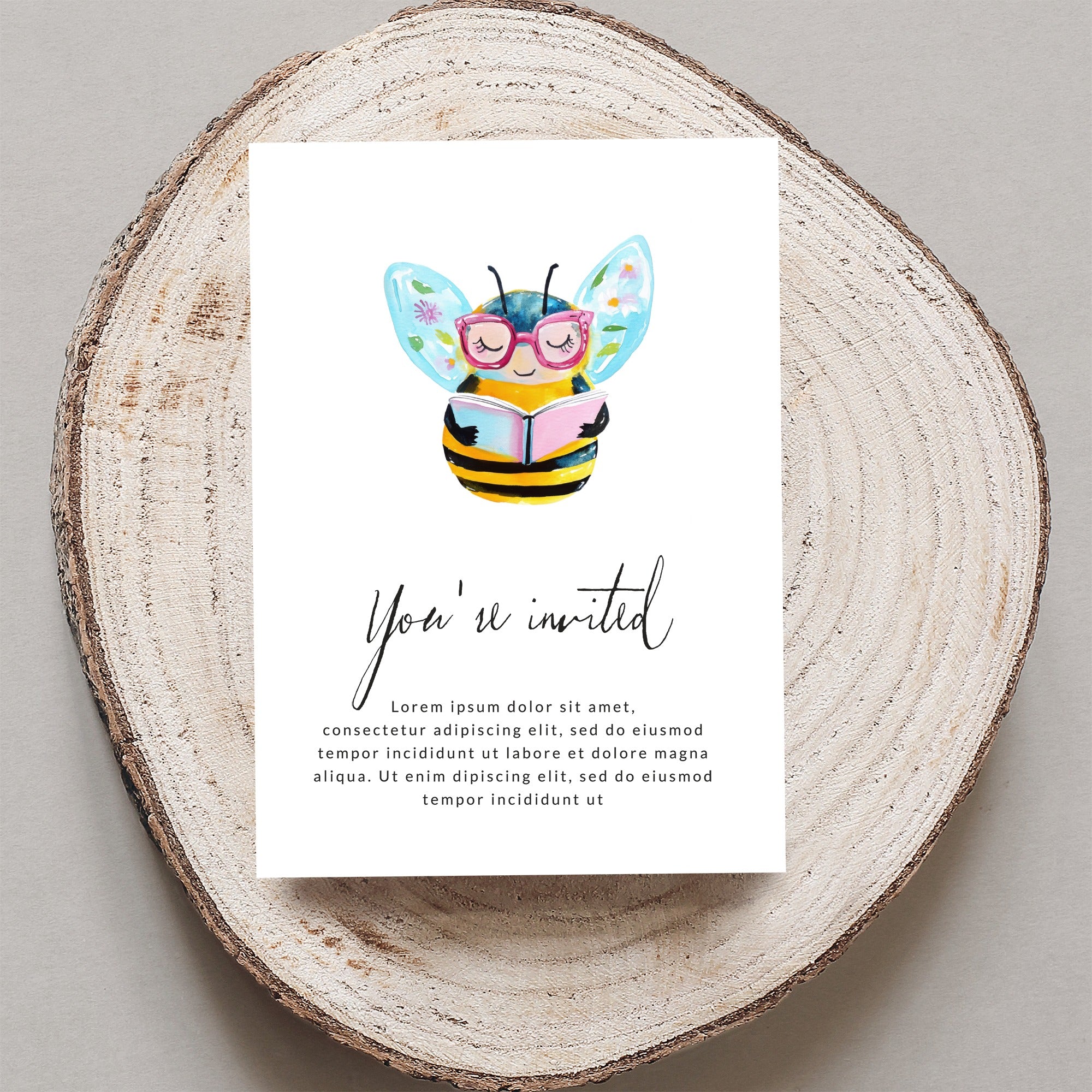 Watercolor illustration of a bee reading a book, with "You're invited" text.