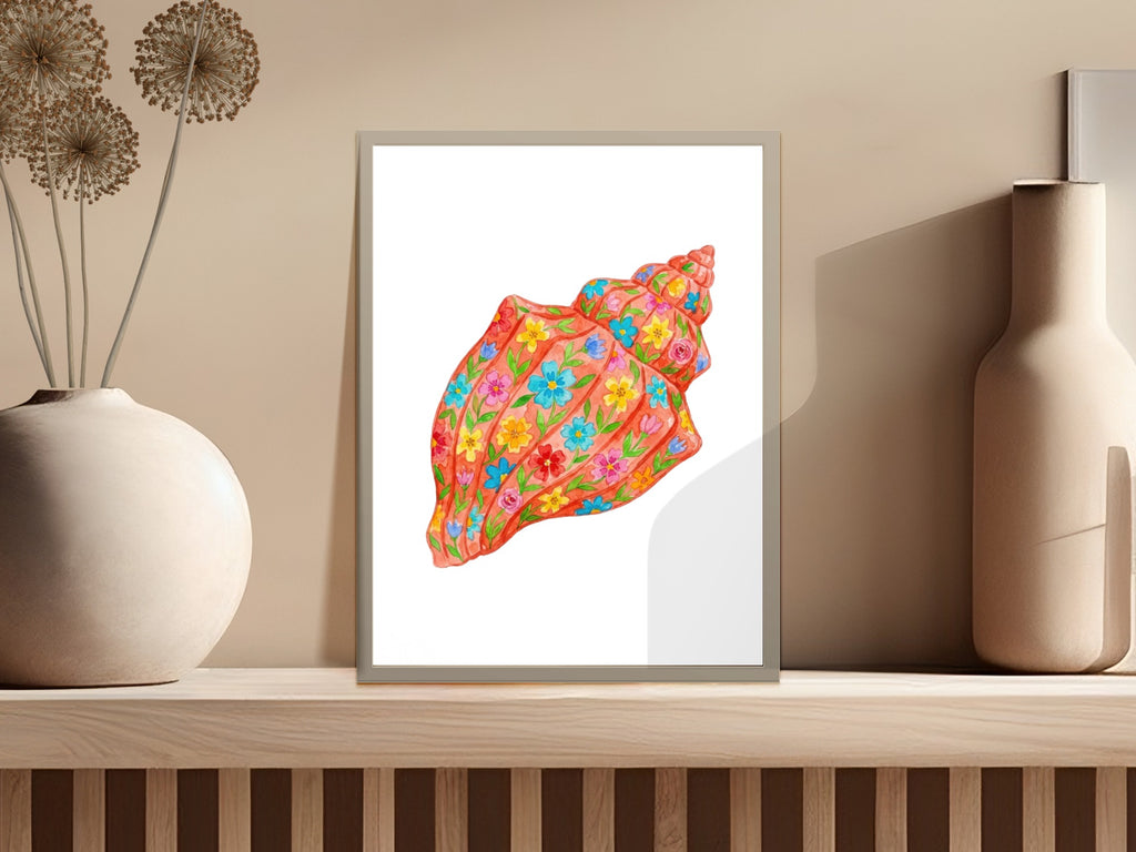 Watercolor seashell art print with colorful floral designs.