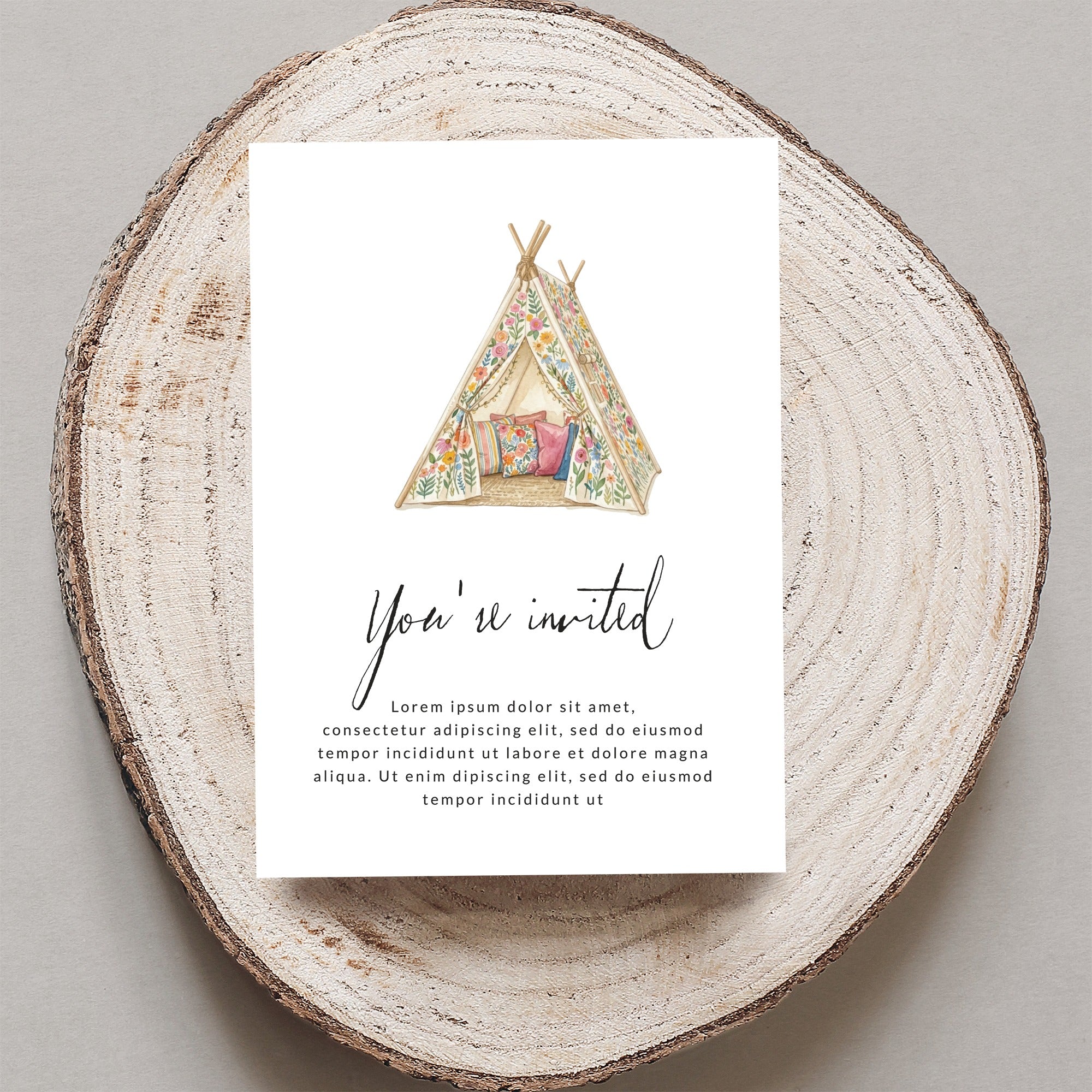 Invitation with floral teepee graphic and placeholder text.
