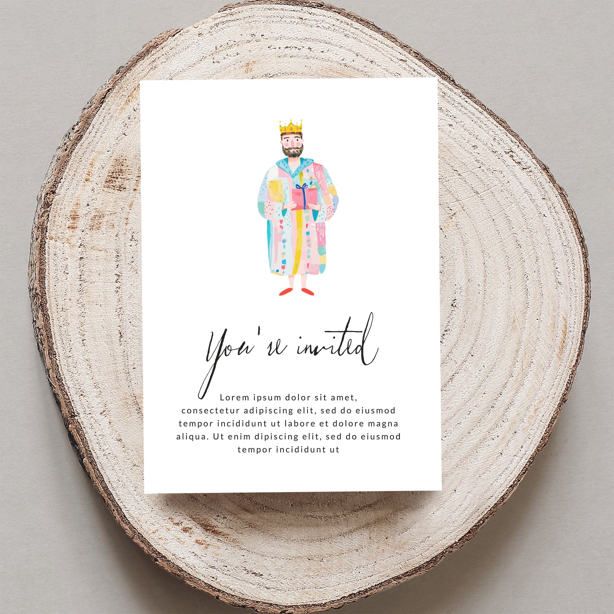 Invitation with colorful illustrated king and "You're invited" text.