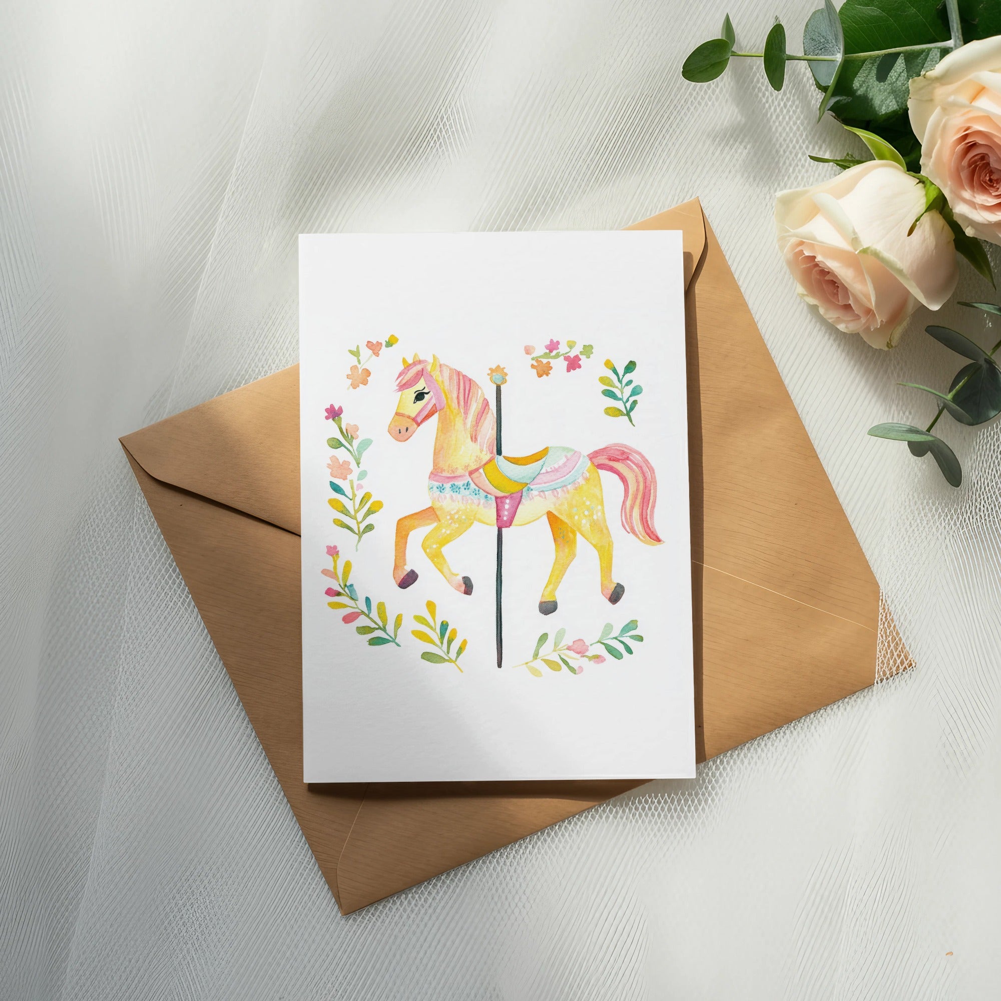 Watercolor carousel horse with floral garland on a brown envelope.