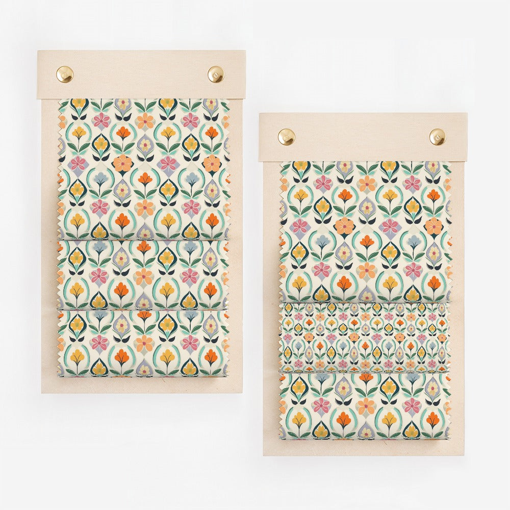 Fabric swatches on a wooden hanger with floral pattern.