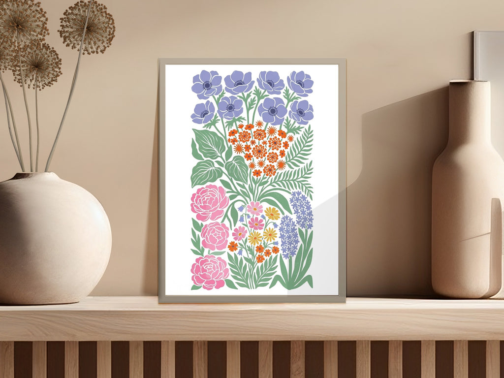 Floral illustration featuring anemones, roses, and foliage in a gray frame.