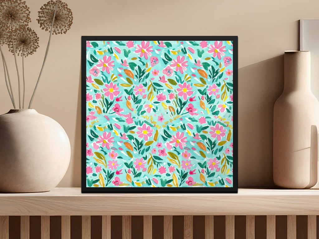 Framed floral watercolor print with pink and green flowers on light blue background.