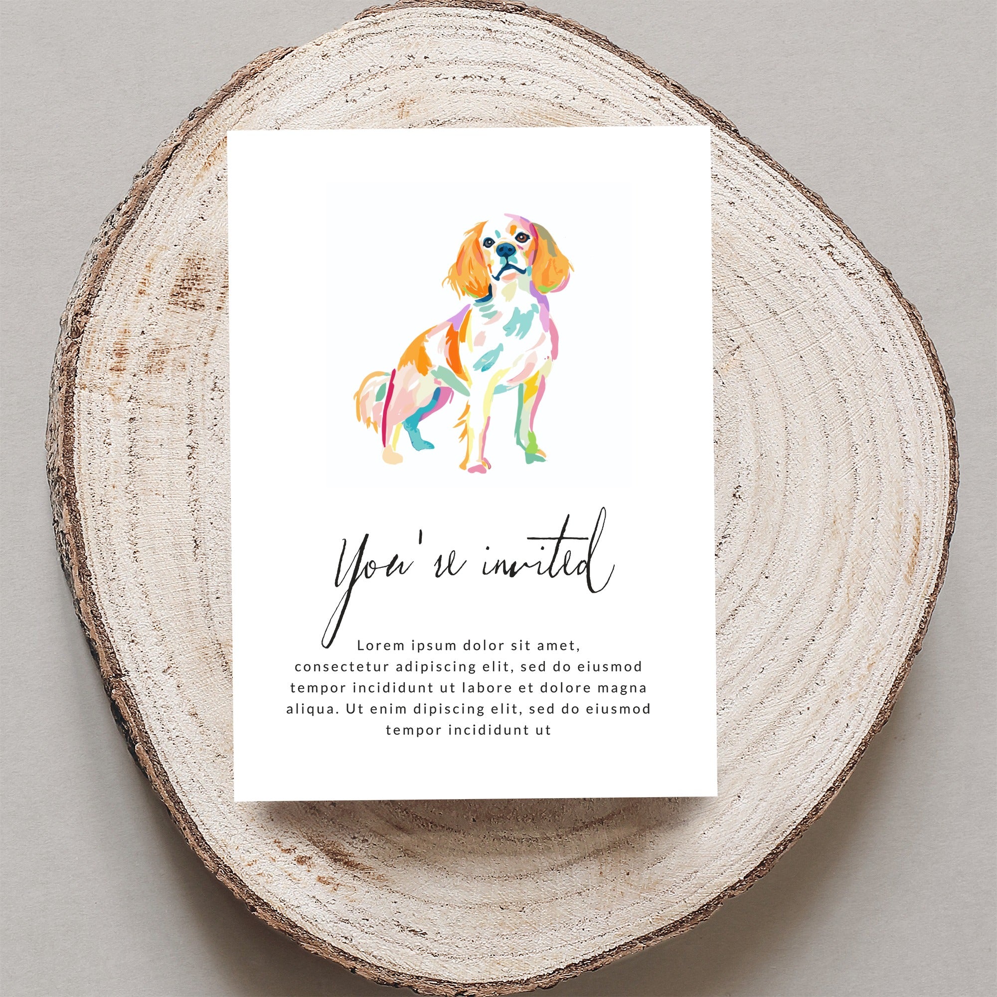 Invitation with colorful dog illustration and "You're invited" text.