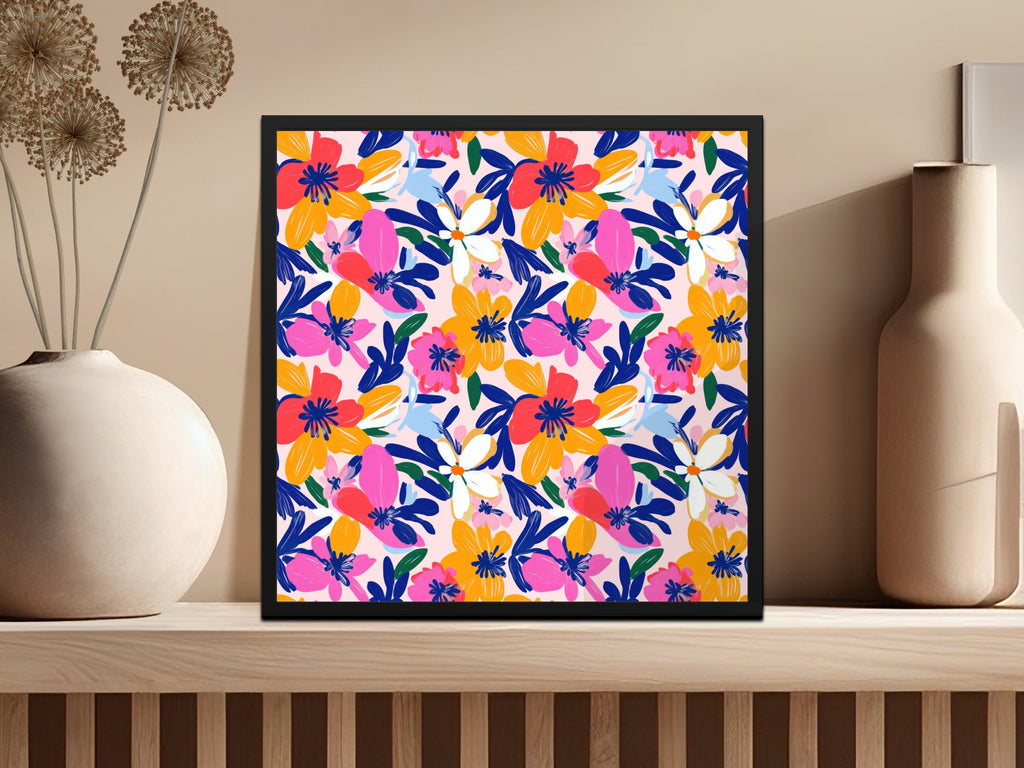 Framed artwork with a colorful floral pattern on a light pink background.