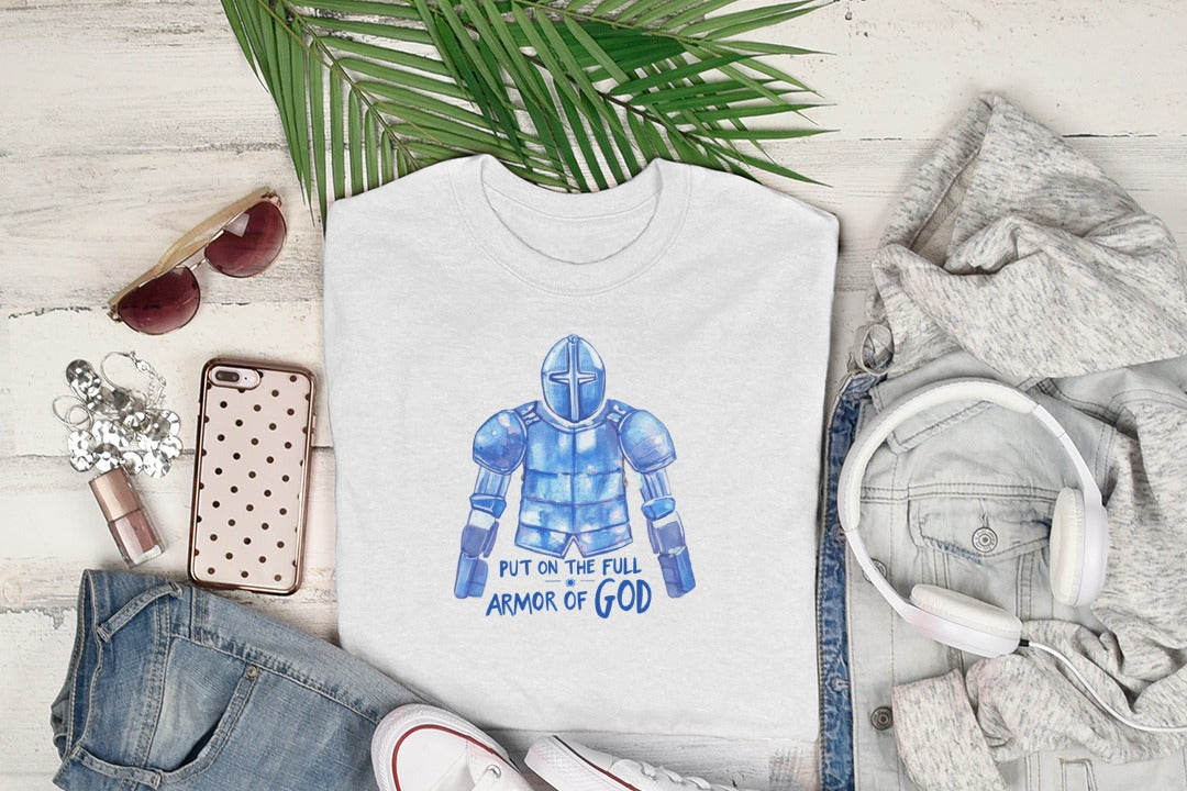 White t-shirt with "PUT ON THE FULL ARMOR OF GOD" and blue armor graphic.
