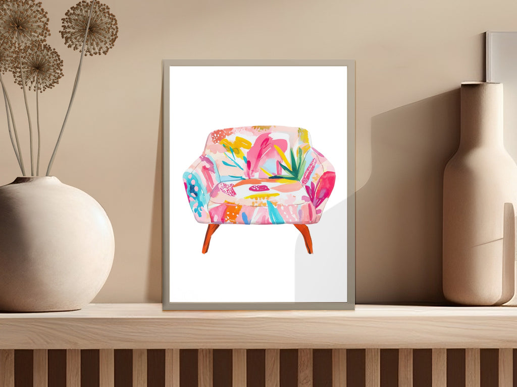 Armchair with colorful abstract floral pattern on wooden legs.
