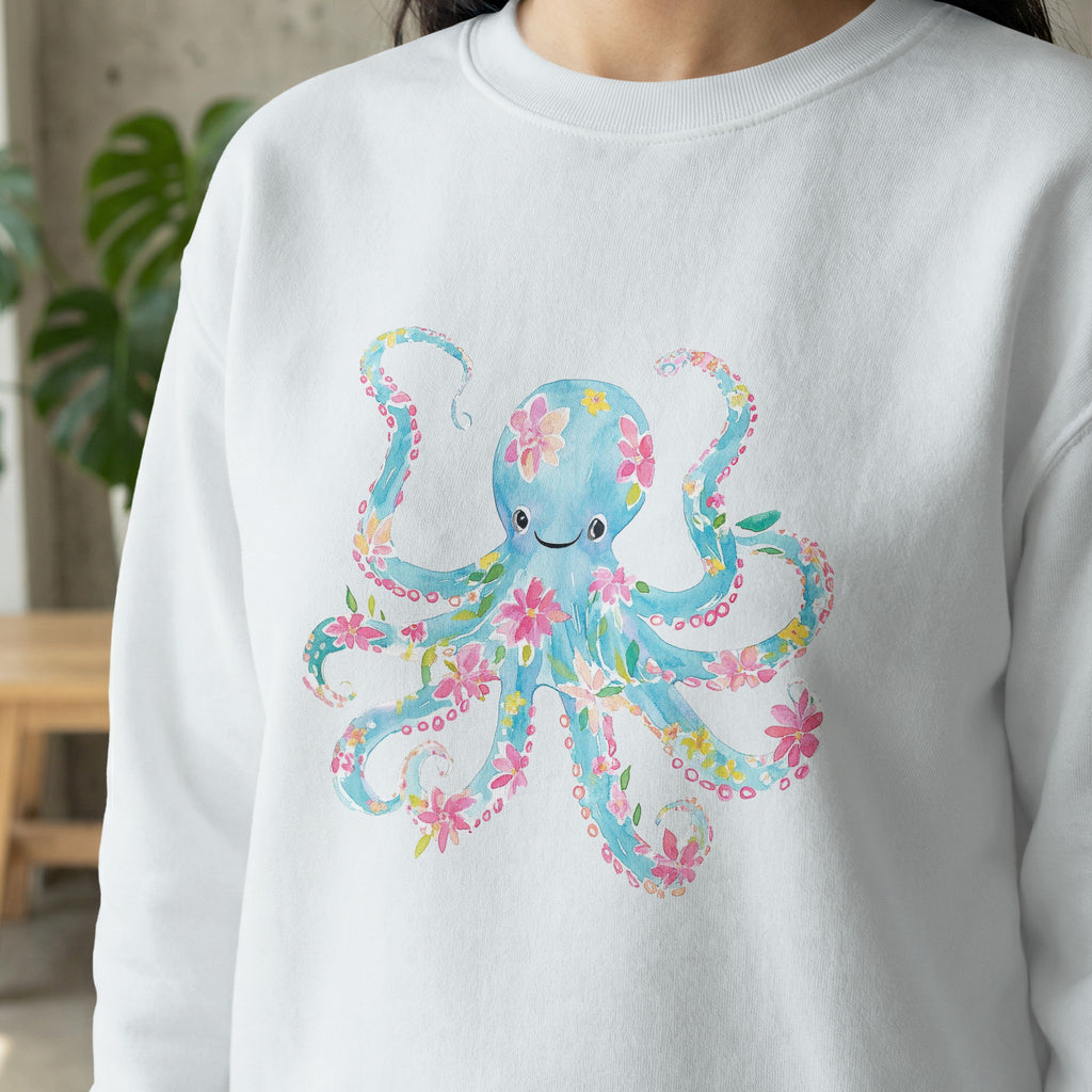 White sweatshirt with blue octopus design and floral accents.